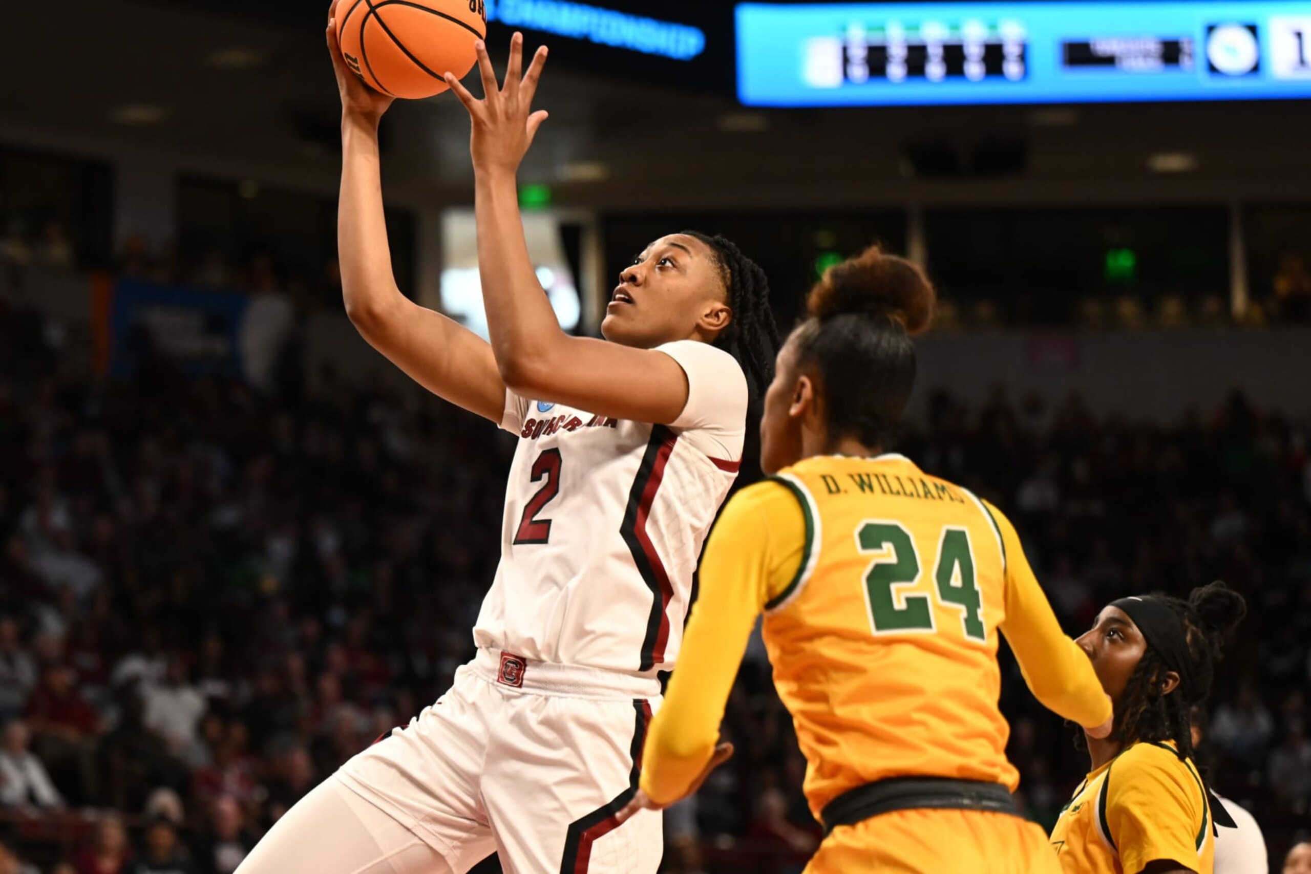 COLUMBIA, SC - MARCH 17: South Carolina Gamecocks forward Ashlyn Watkins (2) drives the lane against Norfolk State Spartans guard Da'naijah Williams (24) during the game between the South Carolina Gamecocks and Norfolk State Spartans in the First Round of the NCAA Women's Basketball Championship Greenville Regional 1 on March 17, 2023 at Colonial Life Arena in Columbia, SC. (Photo by William Howard/Icon Sportswire via Getty Images) COLUMBIA, SC - MARCH 17: South Carolina Gamecocks forward Ashlyn Watkins (2) drives the lane against Norfolk State Spartans guard Da'naijah Williams (24) during the game between the South Carolina Gamecocks and Norfolk State Spartans in the First Round of the NCAA Women's Basketball Championship Greenville Regional 1 on March 17, 2023 at Colonial Life Arena in Columbia, SC. (Photo by William Howard/Icon Sportswire via Getty Images)