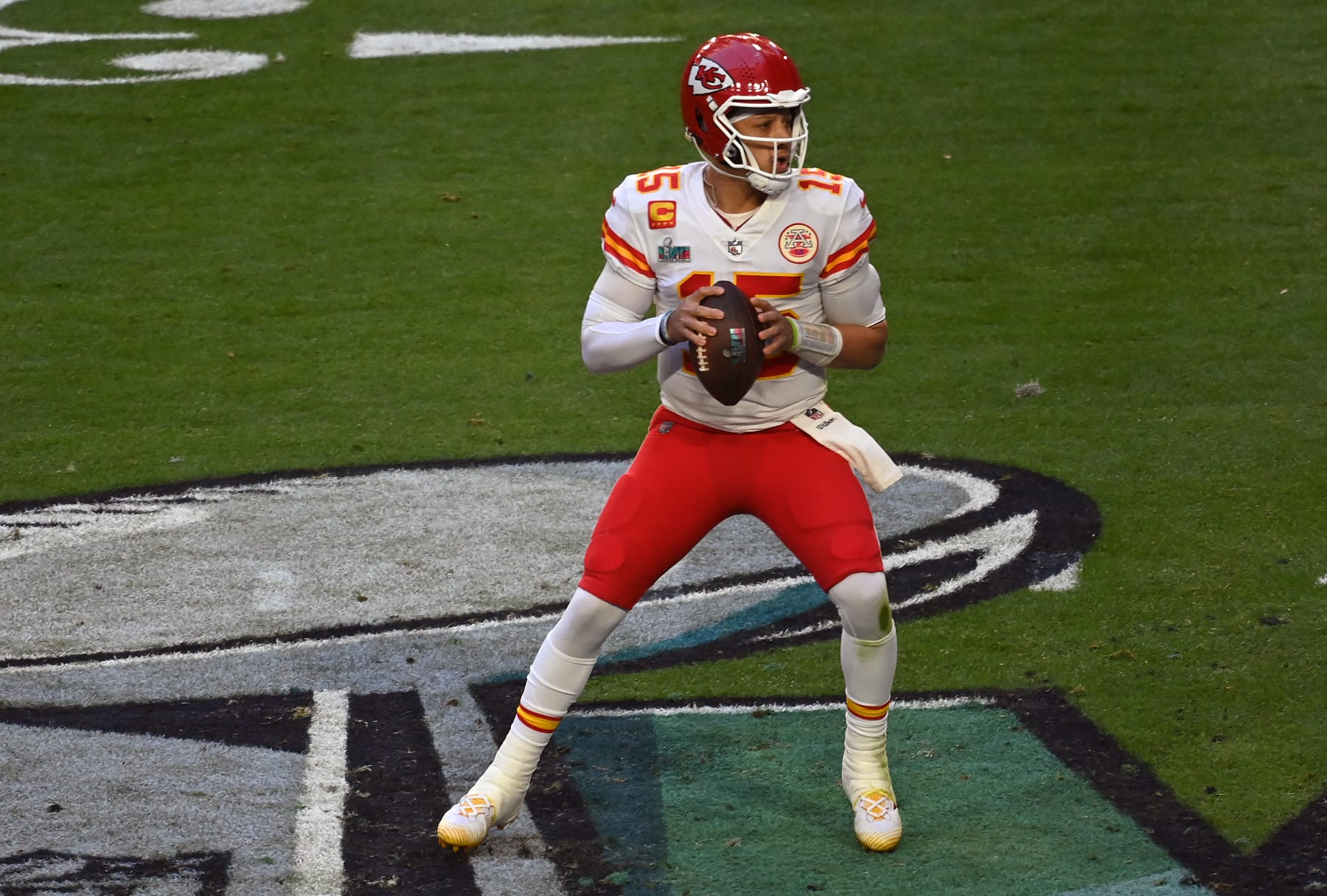GLENDALE, ARIZONA - FEBRUARY 12: Patrick Mahomes #15 of the Kansas City Chiefs looks to pass the ball against the Philadelphia Eagles during the first half in Super Bowl LVII at State Farm Stadium on February 12, 2023 in Glendale, Arizona. (Photo by Focus on Sport/Getty Images)