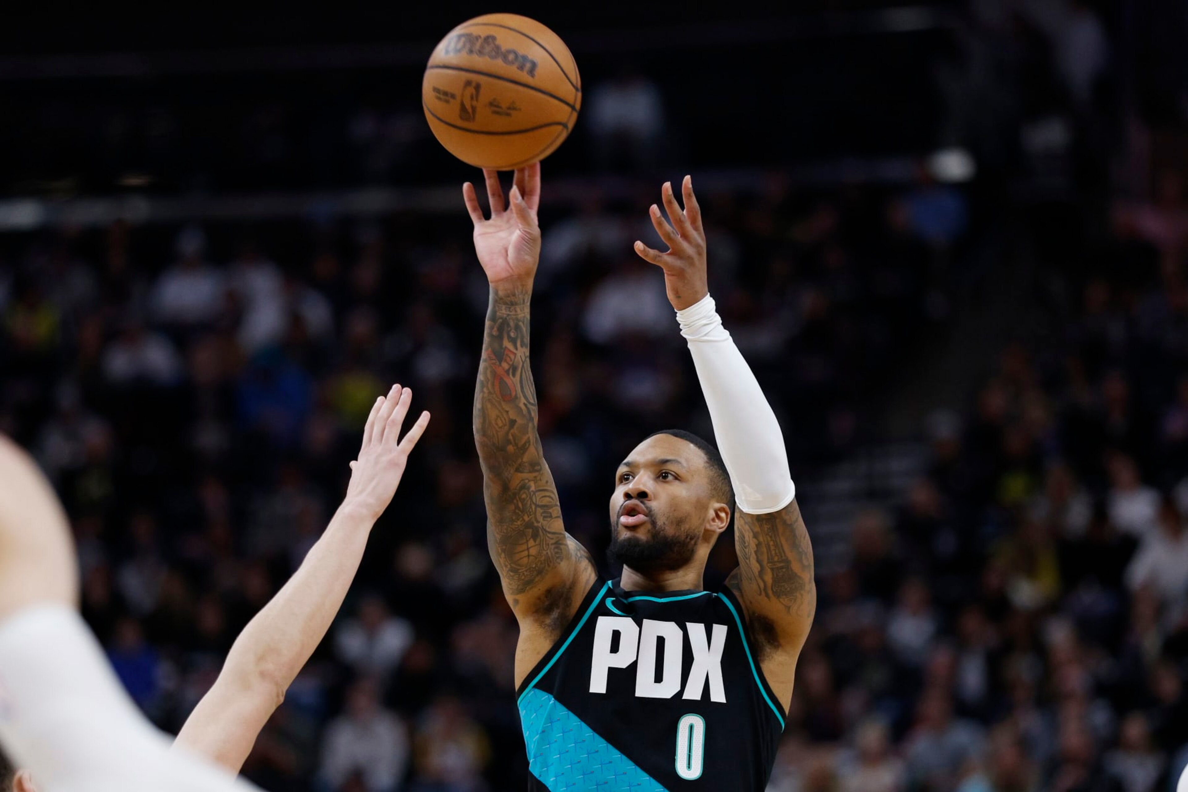 Portland Trail Blazers guard Damian Lillard (0) shoots against the Utah Jazz in the firs half during an NBA basketball game, Wednesday, March 22, 2023, in Salt Lake City. (AP Photo/Jeff Swinger) Portland Trail Blazers guard Damian Lillard (0) shoots against the Utah Jazz in the firs half during an NBA basketball game, Wednesday, March 22, 2023, in Salt Lake City. (AP Photo/Jeff Swinger)