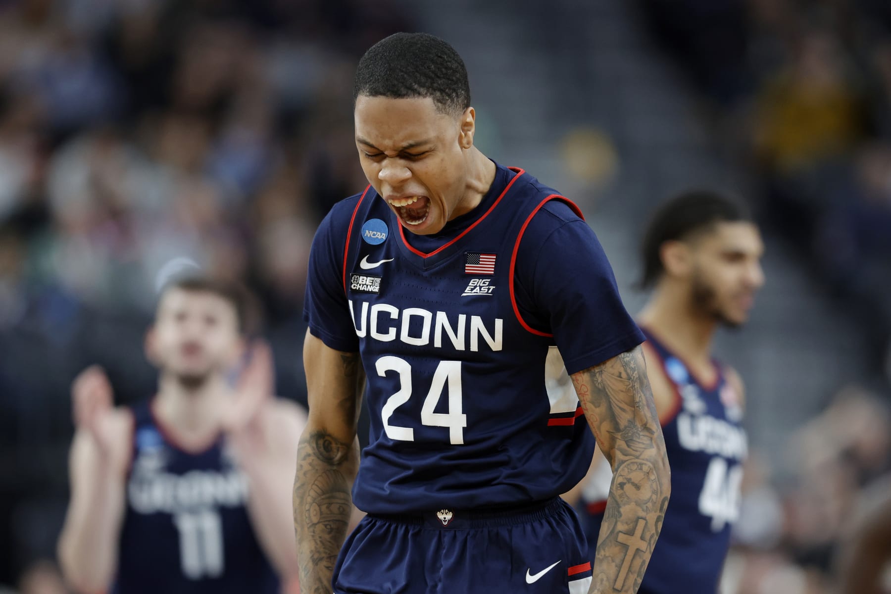 LAS VEGAS, NEVADA - MARCH 25: Jordan Hawkins #24 of the Connecticut Huskies celebrates after making a three point basket during the second half against the Gonzaga Bulldogs in the Elite Eight round of the NCAA Men's Basketball Tournament at T-Mobile Arena on March 25, 2023 in Las Vegas, Nevada. (Photo by Carmen Mandato/Getty Images)
