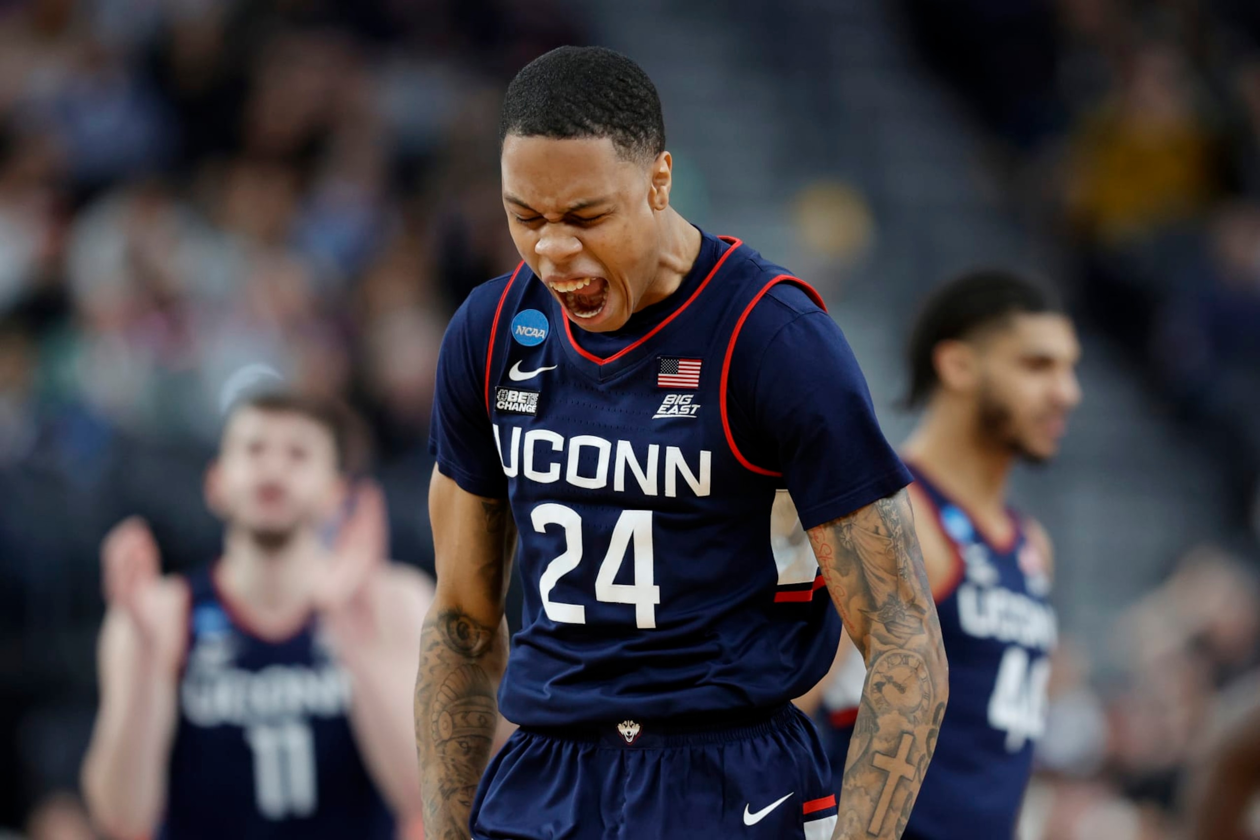LAS VEGAS, NEVADA - MARCH 25: Jordan Hawkins #24 of the Connecticut Huskies celebrates after making a three point basket during the second half against the Gonzaga Bulldogs in the Elite Eight round of the NCAA Men's Basketball Tournament at T-Mobile Arena on March 25, 2023 in Las Vegas, Nevada. (Photo by Carmen Mandato/Getty Images)