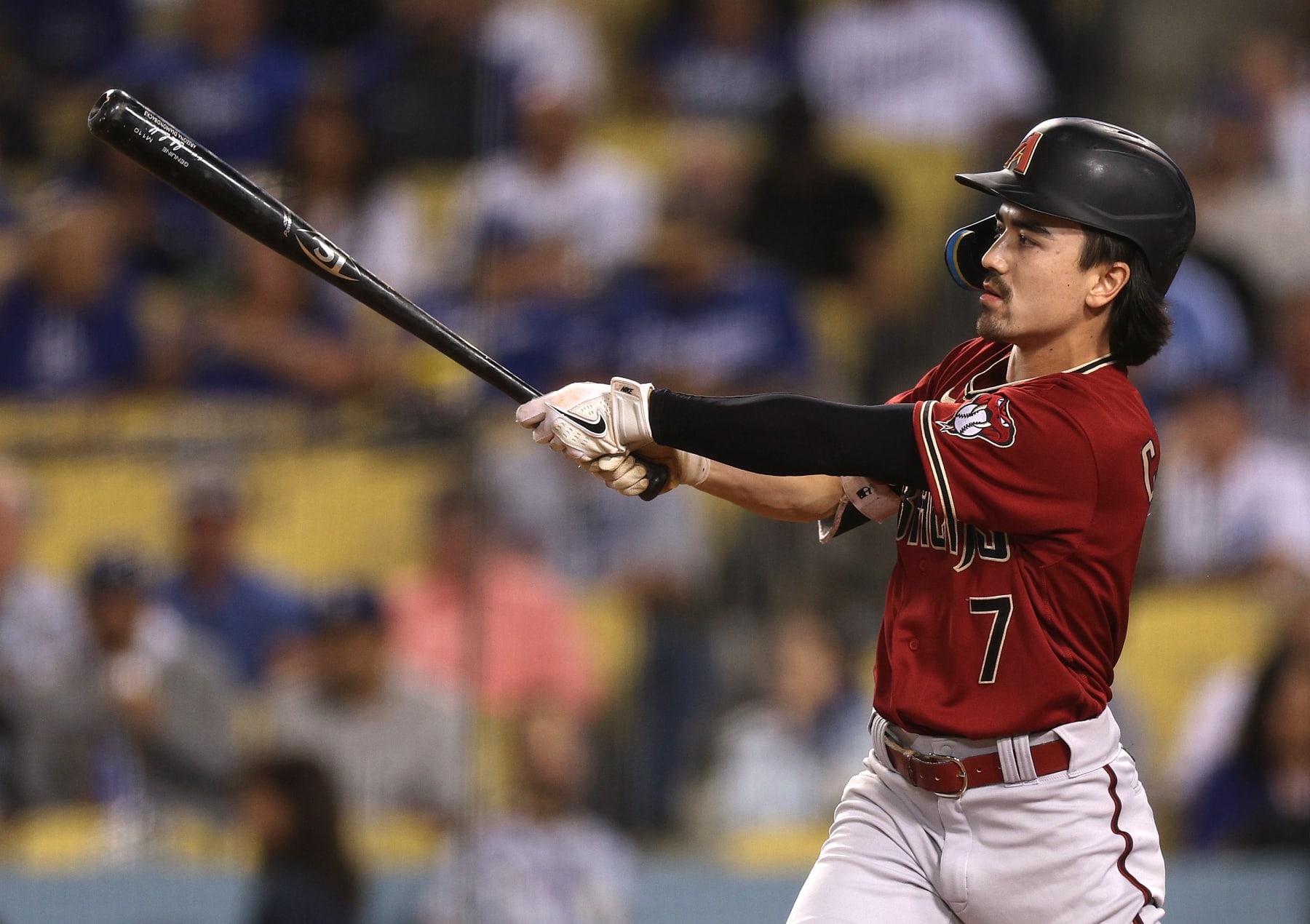 LOS ANGELES, CALIFORNIA - SEPTEMBER 21: Corbin Carroll #7 of the Arizona Diamondbacks at bat during the game against the Los Angeles Dodgers at Dodger Stadium on September 21, 2022 in Los Angeles, California. (Photo by Harry How/Getty Images)