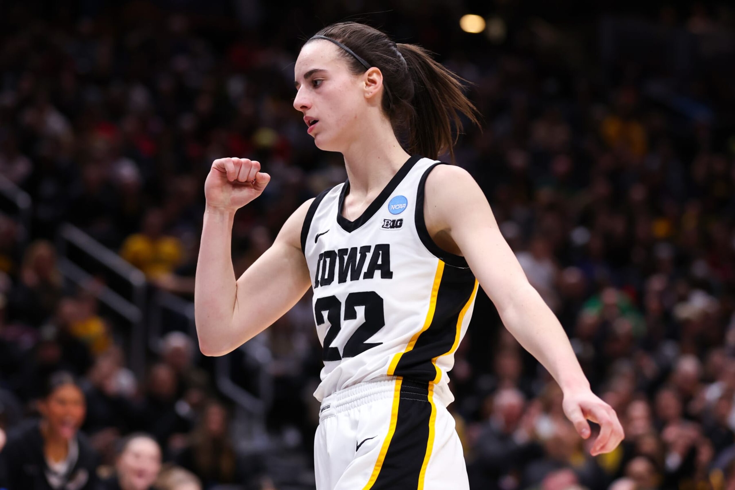 SEATTLE, WASHINGTON - MARCH 24: Caitlin Clark #22 of the Iowa Hawkeyes reacts during the third quarter against the Colorado Buffaloes in the Sweet 16 round of the NCAA Women's Basketball Tournament at Climate Pledge Arena on March 24, 2023 in Seattle, Washington. (Photo by Steph Chambers/Getty Images) SEATTLE, WASHINGTON - MARCH 24: Caitlin Clark #22 of the Iowa Hawkeyes reacts during the third quarter against the Colorado Buffaloes in the Sweet 16 round of the NCAA Women's Basketball Tournament at Climate Pledge Arena on March 24, 2023 in Seattle, Washington. (Photo by Steph Chambers/Getty Images)