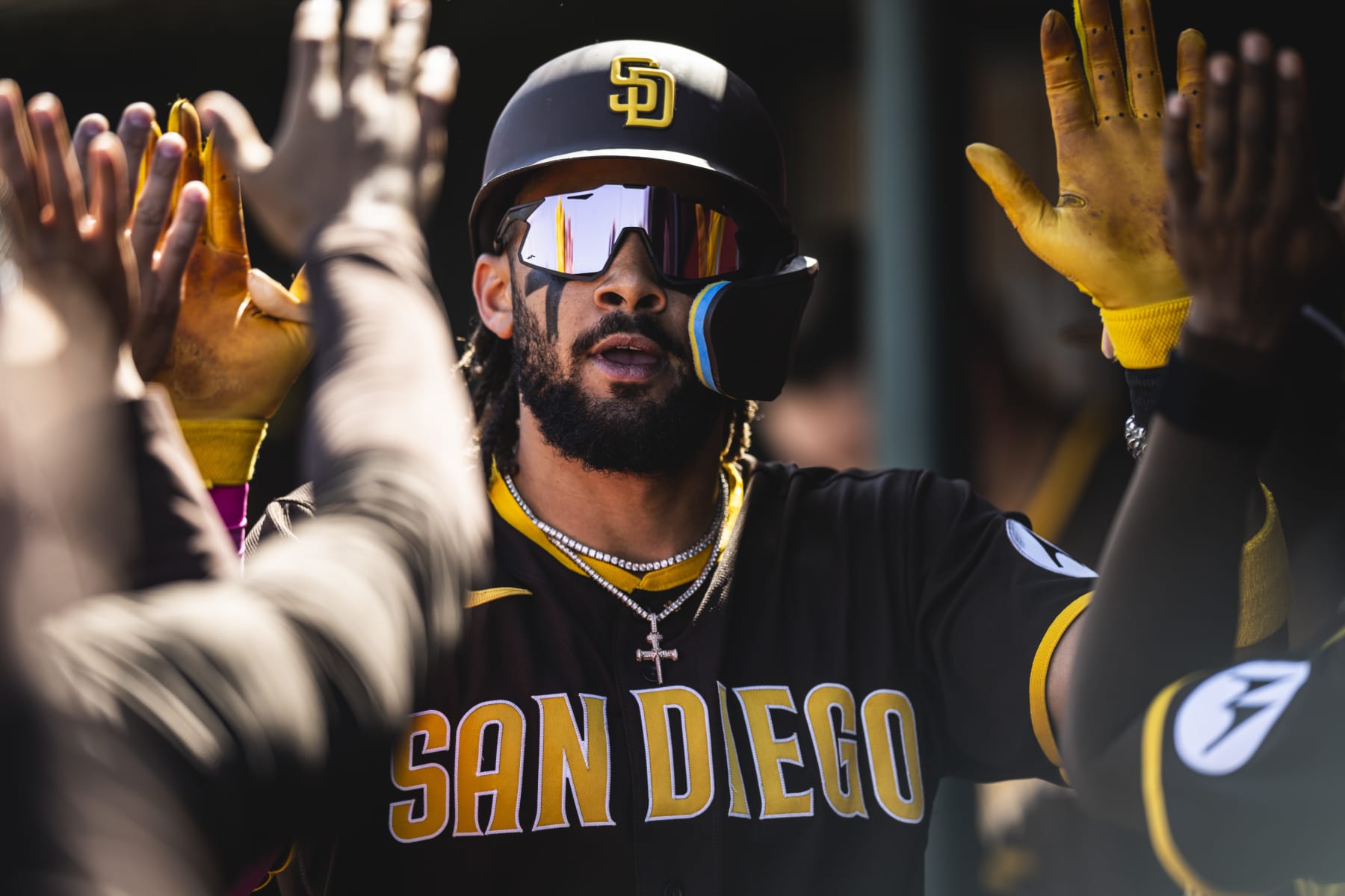 TEMPE, AZ - MARCH 24: Fernando Tatis Jr. #23 of the San Diego Padres celebrates in the dugout after hitting a home run during a spring training game against the Los Angeles Angels on March 24, 2023 at the Tempe Diablo Stadium in Tempe, Arizona. (Photo by Matt Thomas/San Diego Padres/Getty Images)