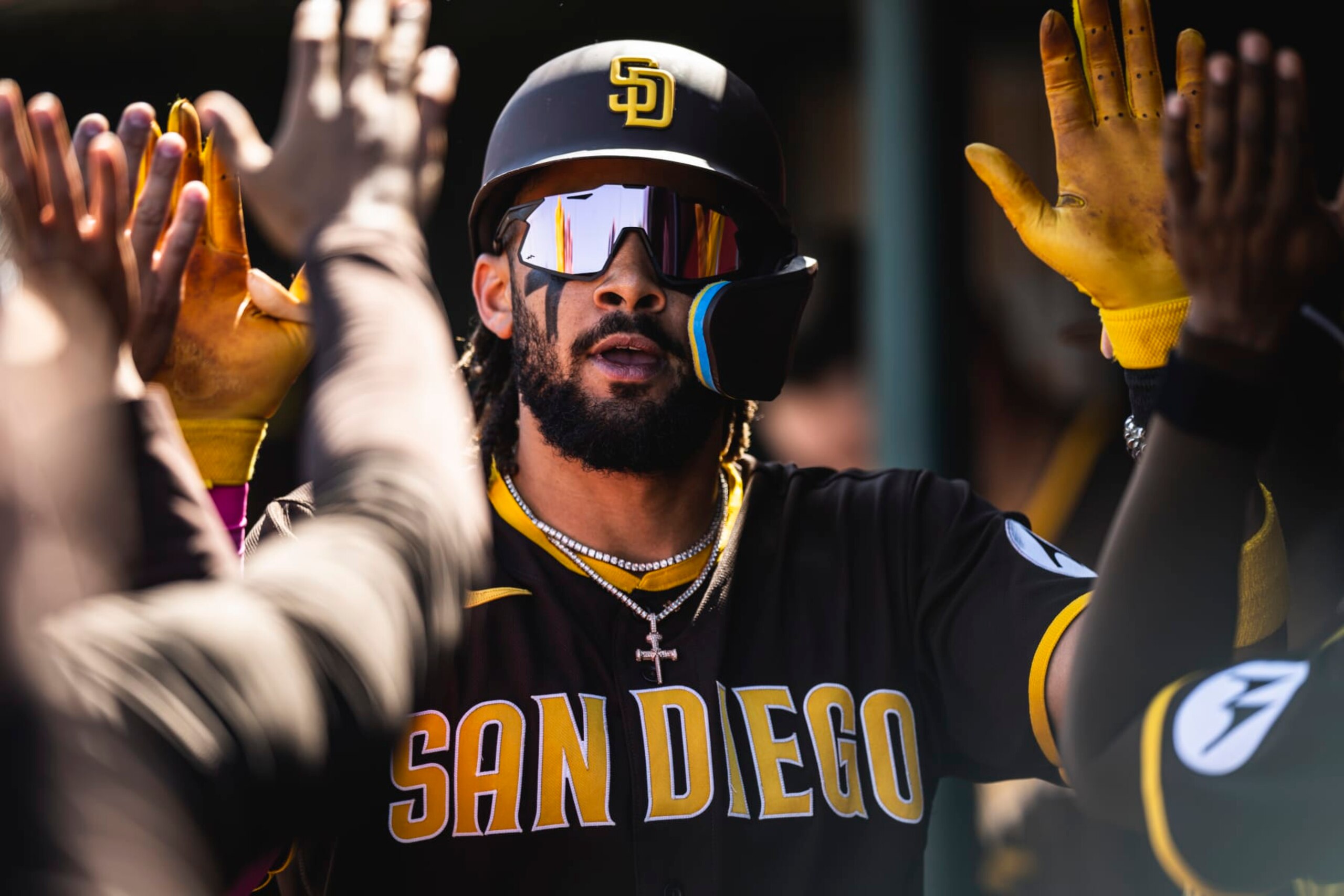 TEMPE, AZ - MARCH 24: Fernando Tatis Jr. #23 of the San Diego Padres celebrates in the dugout after hitting a home run during a spring training game against the Los Angeles Angels on March 24, 2023 at the Tempe Diablo Stadium in Tempe, Arizona. (Photo by Matt Thomas/San Diego Padres/Getty Images)