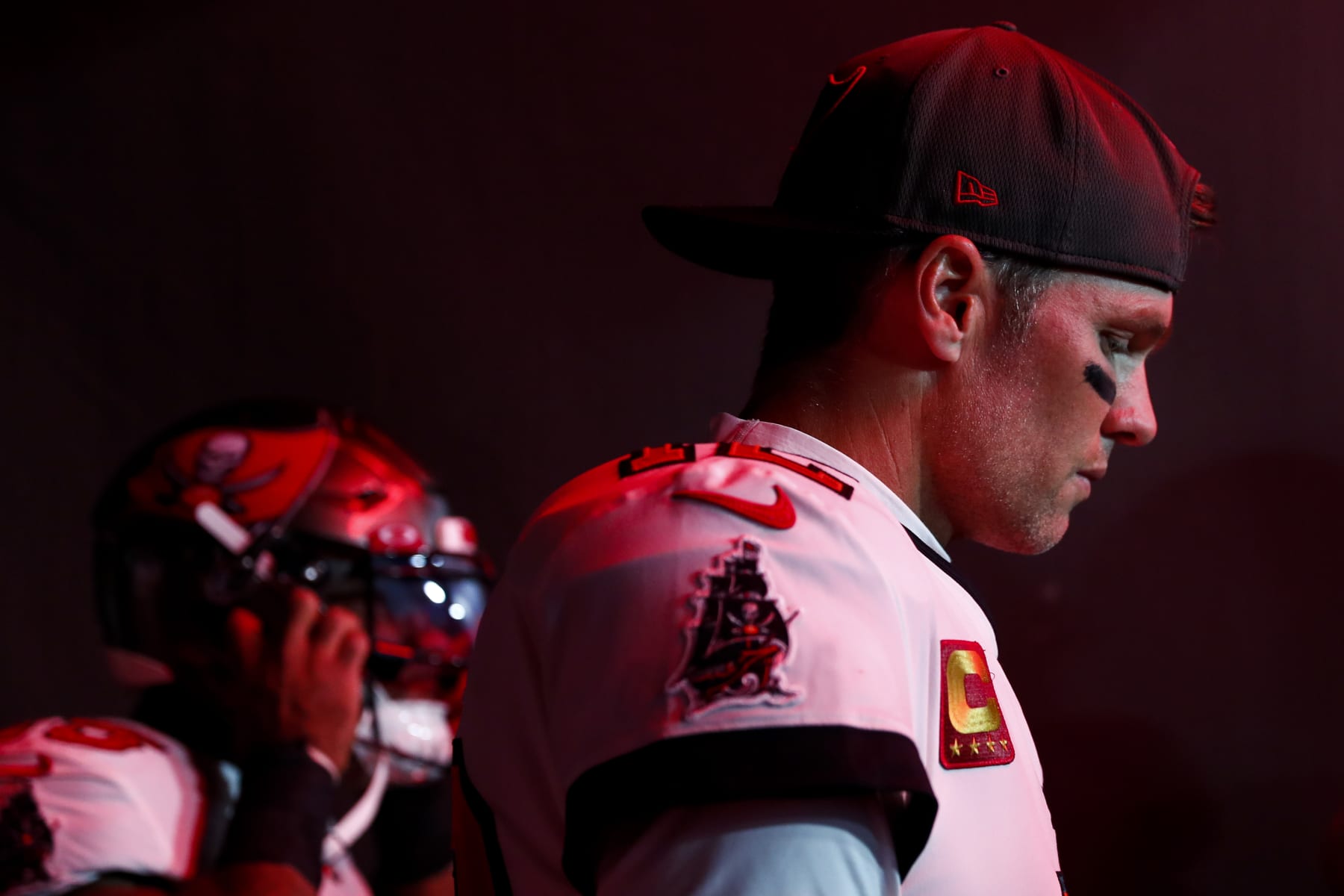 TAMPA, FL - JANUARY 16: Tom Brady #12 of the Tampa Bay Buccaneers walks through the tunnel prior to an NFL wild card playoff football game against the Dallas Cowboys at Raymond James Stadium on January 16, 2023 in Tampa, Florida. (Photo by Kevin Sabitus/Getty Images)