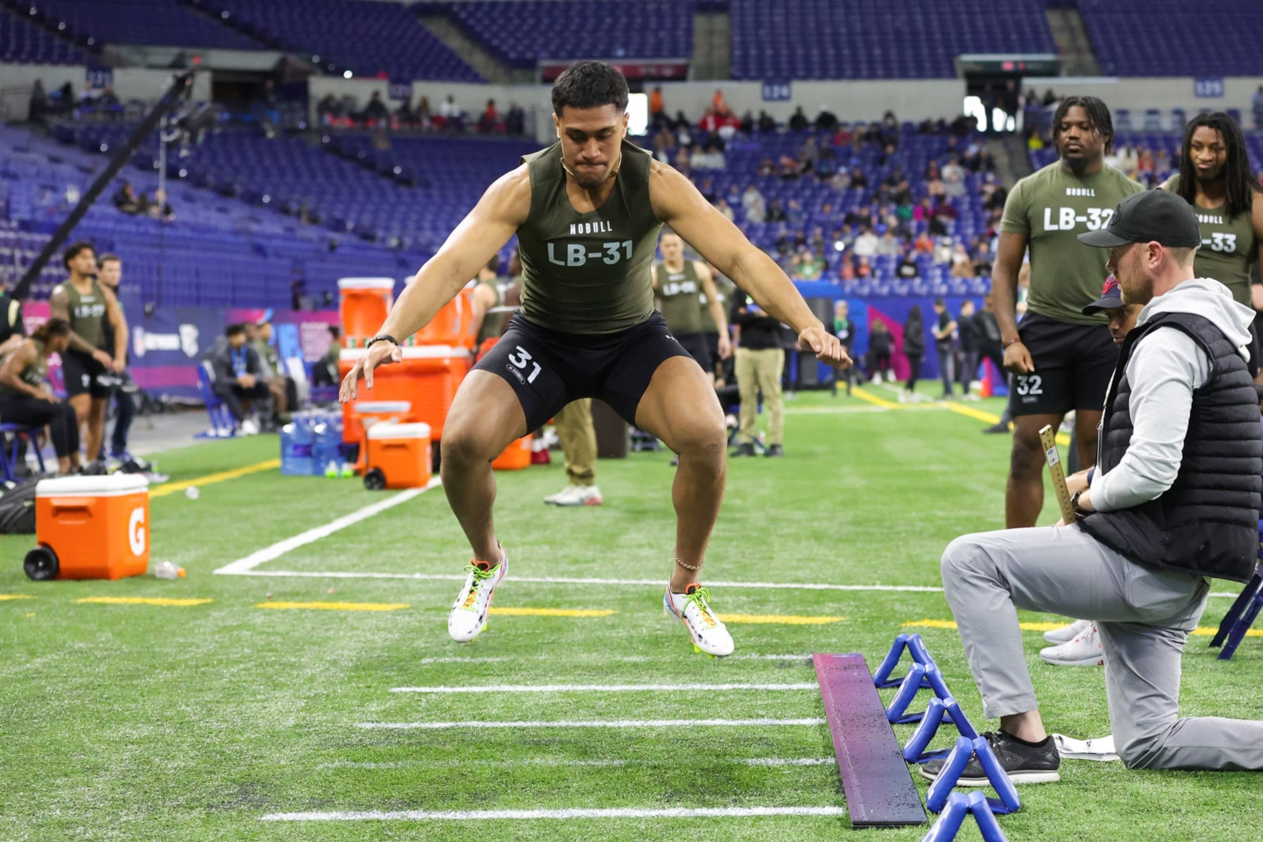 INDIANAPOLIS, INDIANA - MARCH 02: Linebacker Henry To'Oto'O of Alabama participates in the broad jump during the NFL Combine at Lucas Oil Stadium on March 02, 2023 in Indianapolis, Indiana. (Photo by Stacy Revere/Getty Images)