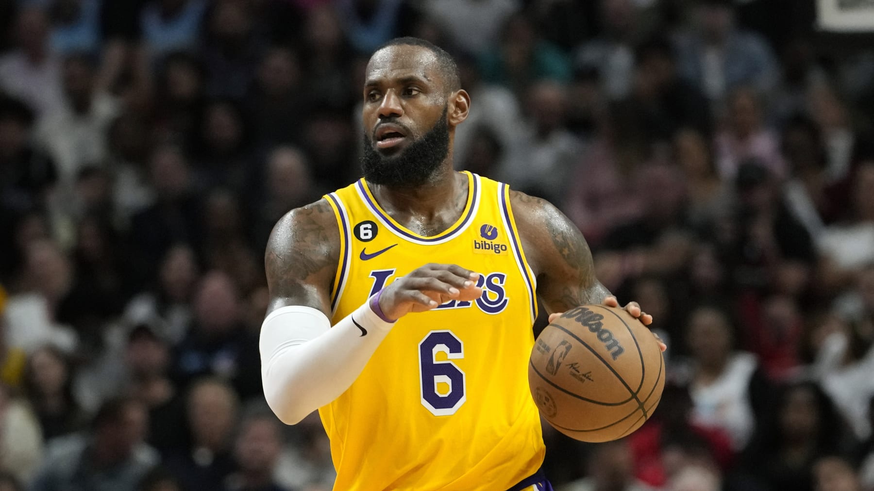 Los Angeles Lakers forward LeBron James (6) moves the ball down the court during the second half of an NBA basketball game against the Miami Heat, Wednesday, Dec. 28, 2022, in Miami. The Heat won 112-98. (AP Photo/Lynne Sladky)