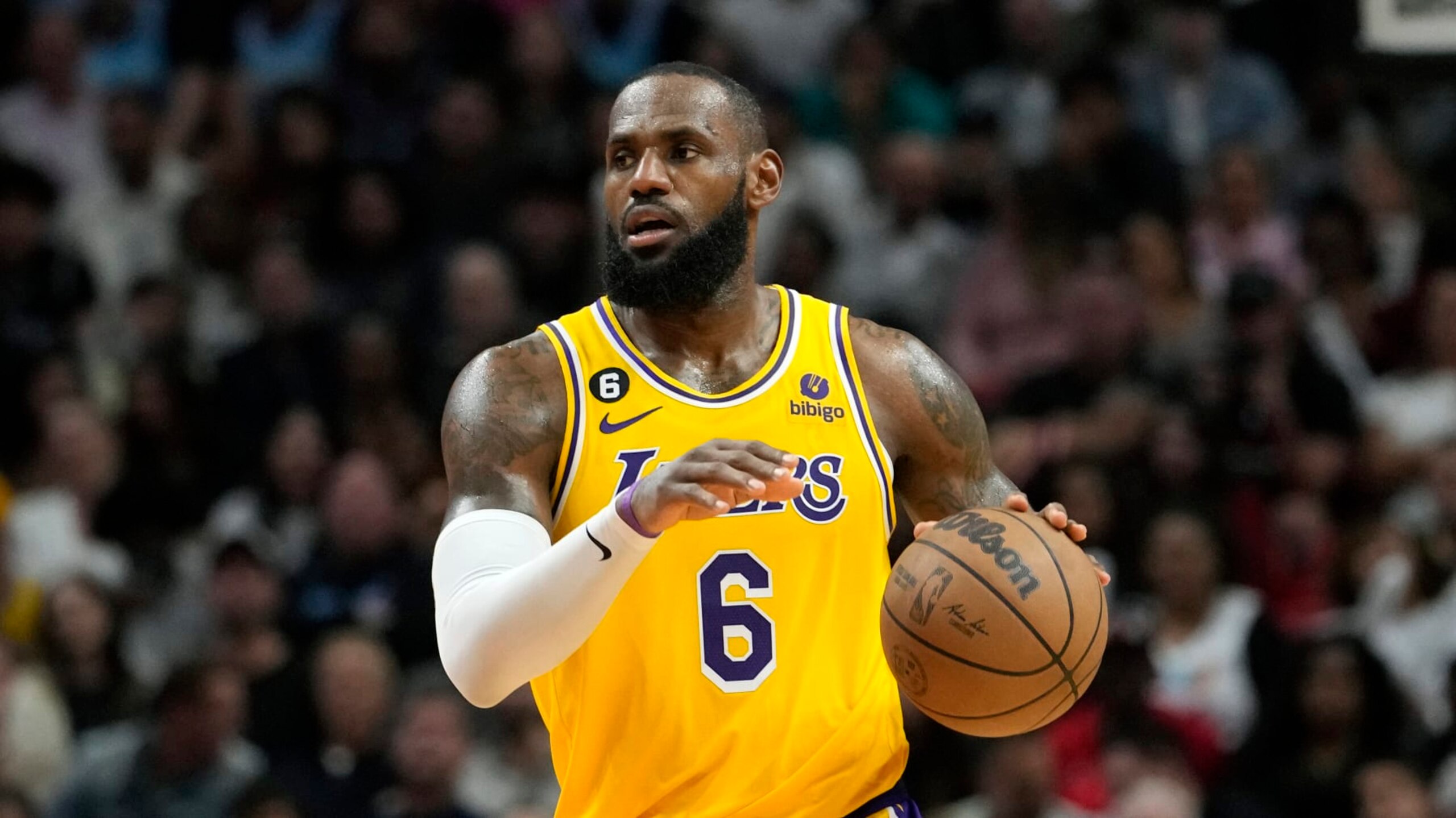 Los Angeles Lakers forward LeBron James (6) moves the ball down the court during the second half of an NBA basketball game against the Miami Heat, Wednesday, Dec. 28, 2022, in Miami. The Heat won 112-98. (AP Photo/Lynne Sladky)