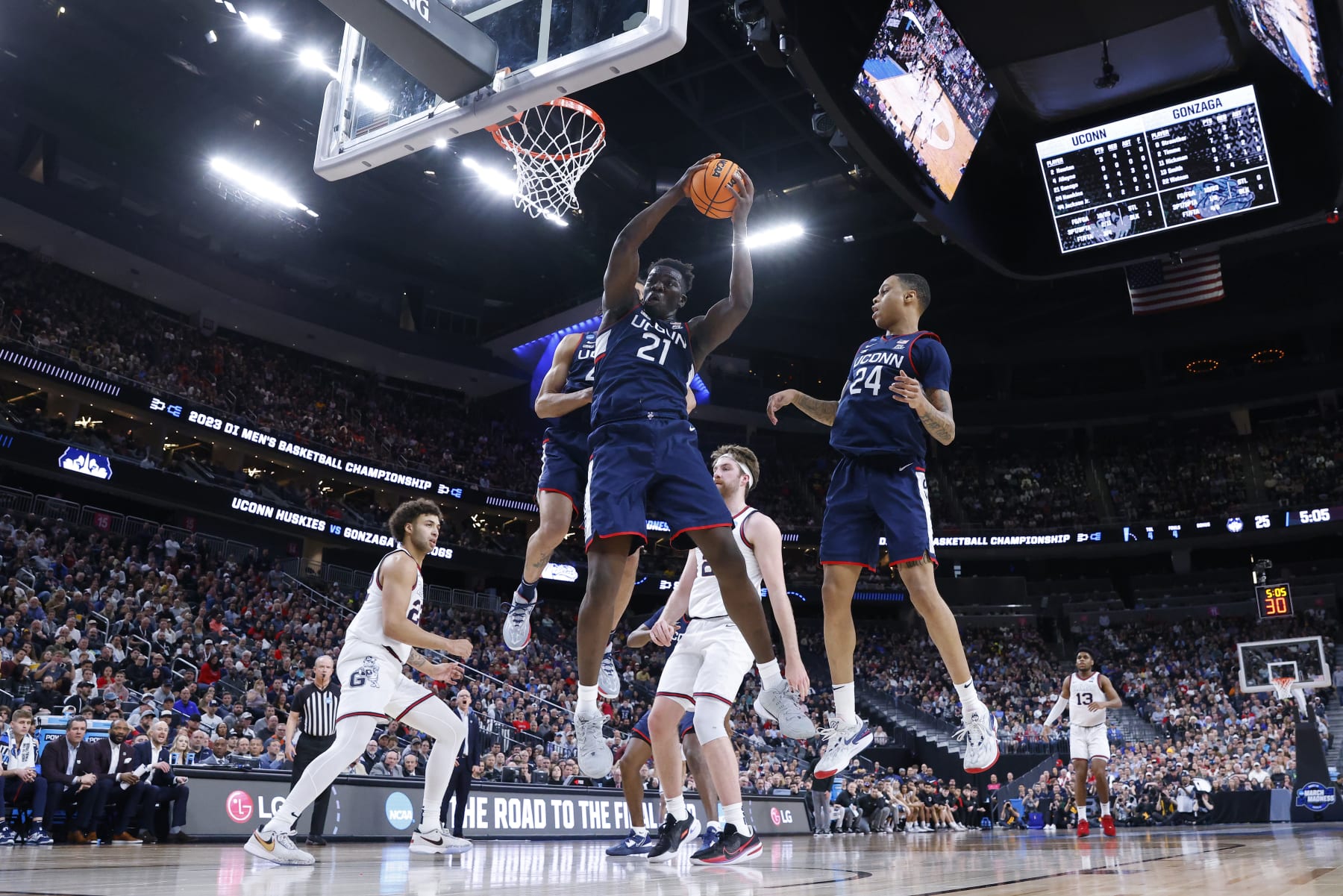 LAS VEGAS, NEVADA - MARCH 25: Adama Sanogo #21 of the Connecticut Huskies rebounds the ball during the first half against the Gonzaga Bulldogs in the Elite Eight round of the NCAA Men's Basketball Tournament at T-Mobile Arena on March 25, 2023 in Las Vegas, Nevada. (Photo by Sean M. Haffey/Getty Images)