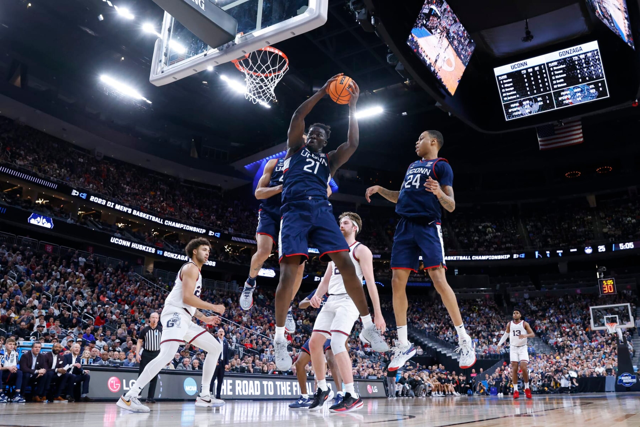 LAS VEGAS, NEVADA - MARCH 25: Adama Sanogo #21 of the Connecticut Huskies rebounds the ball during the first half against the Gonzaga Bulldogs in the Elite Eight round of the NCAA Men's Basketball Tournament at T-Mobile Arena on March 25, 2023 in Las Vegas, Nevada. (Photo by Sean M. Haffey/Getty Images)