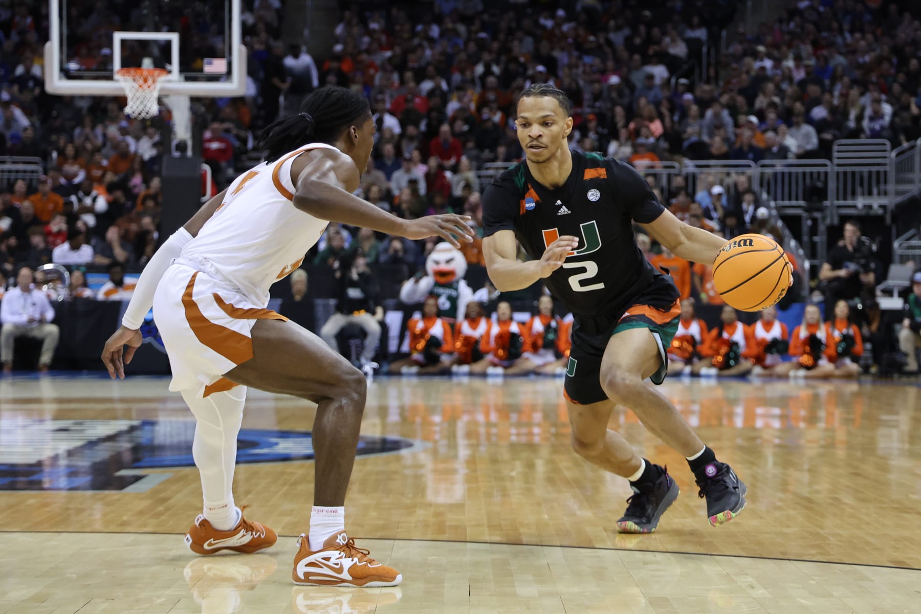 KANSAS CITY, MISSOURI - MARCH 26: Isaiah Wong #2 of the Miami Hurricanes dribbles during the first half against the Texas Longhorns in the Elite Eight round of the NCAA Men's Basketball Tournament at T-Mobile Center on March 26, 2023 in Kansas City, Missouri. (Photo by Gregory Shamus/Getty Images)