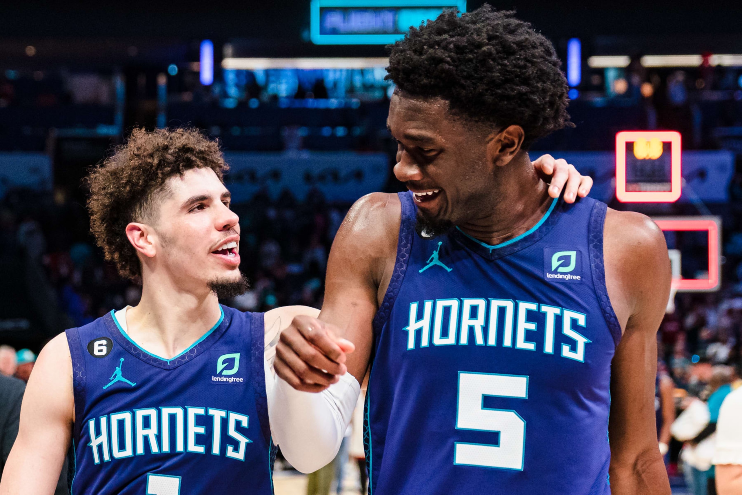 CHARLOTTE, NORTH CAROLINA - FEBRUARY 25: LaMelo Ball #1 congratulates Mark Williams #5 of the Charlotte Hornets after defeating the Miami Heat during their game at Spectrum Center on February 25, 2023 in Charlotte, North Carolina. NOTE TO USER: User expressly acknowledges and agrees that, by downloading and or using this photograph, User is consenting to the terms and conditions of the Getty Images License Agreement. (Photo by Jacob Kupferman/Getty Images)