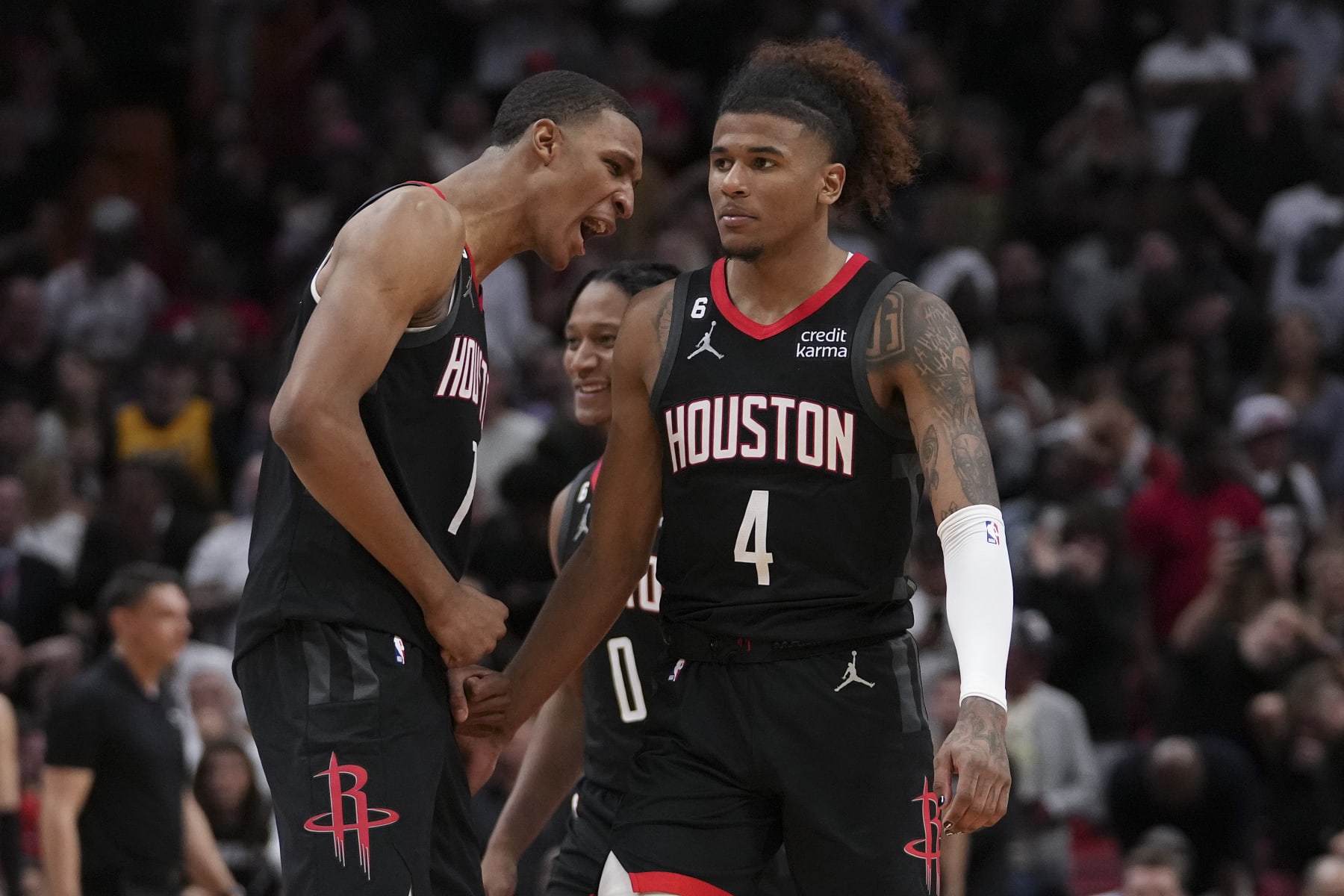 MIAMI, FLORIDA - FEBRUARY 10: Jabari Smith Jr. #1 of the Houston Rockets celebrates with Jalen Green #4 after he hit a game tying shot in the fourth quarter against the Miami Heat at Miami-Dade Arena on February 10, 2023 in Miami, Florida. NOTE TO USER: User expressly acknowledges and agrees that,  by downloading and or using this photograph,  User is consenting to the terms and conditions of the Getty Images License Agreement. (Photo by Eric Espada/Getty Images)
