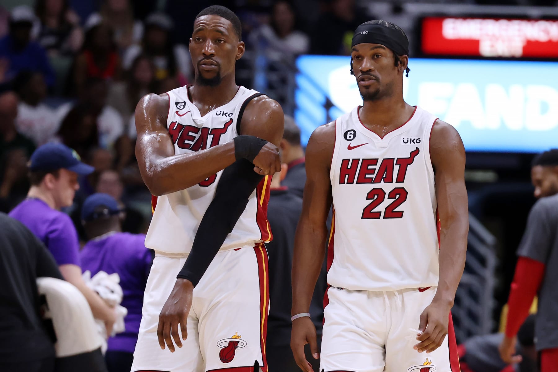 NEW ORLEANS, LOUISIANA - JANUARY 18: Bam Adebayo #13 and Jimmy Butler #22 of the Miami Heat react against the New Orleans Pelicans during a game at the Smoothie King Center on January 18, 2023 in New Orleans, Louisiana. NOTE TO USER: User expressly acknowledges and agrees that, by downloading and or using this Photograph, user is consenting to the terms and conditions of the Getty Images License Agreement. (Photo by Jonathan Bachman/Getty Images)