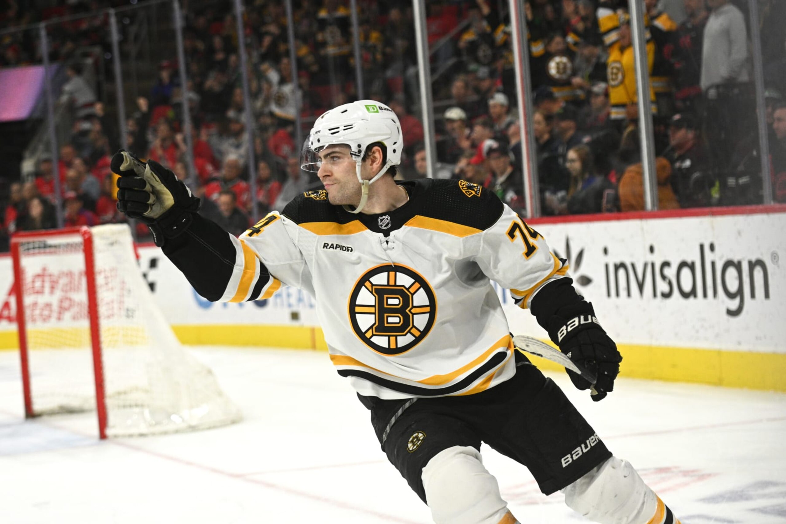 RALEIGH, NC - MARCH 26: Boston Bruins Right Wing Jake DeBrusk (74) celebrates scoring in the shootout during the game between the Boston Bruins and the Carolina Hurricanes on March 26, 2023 at PNC Arena in Raleigh, North Carolina. (Photo by Katherine Gawlik/Icon Sportswire via Getty Images)