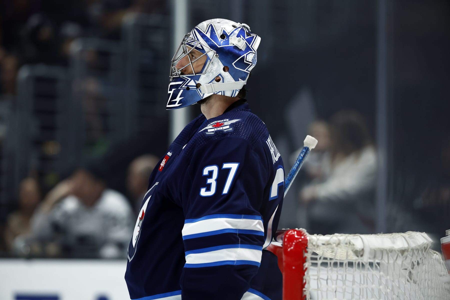 LOS ANGELES, CALIFORNIA - MARCH 25:  Connor Hellebuyck #37 of the Winnipeg Jets in the second period at Crypto.com Arena on March 25, 2023 in Los Angeles, California. (Photo by Ronald Martinez/Getty Images)