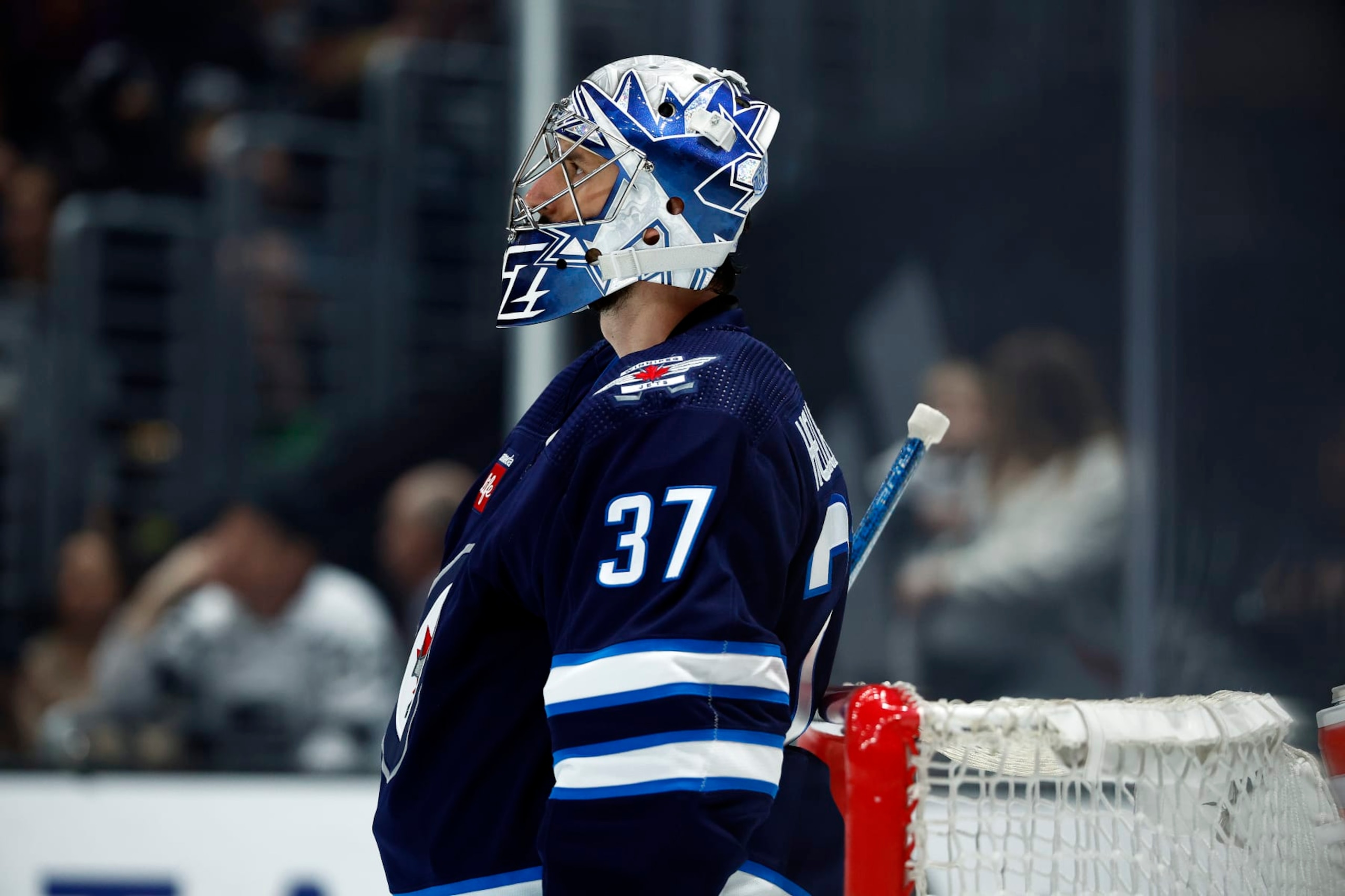 LOS ANGELES, CALIFORNIA - MARCH 25:  Connor Hellebuyck #37 of the Winnipeg Jets in the second period at Crypto.com Arena on March 25, 2023 in Los Angeles, California. (Photo by Ronald Martinez/Getty Images)