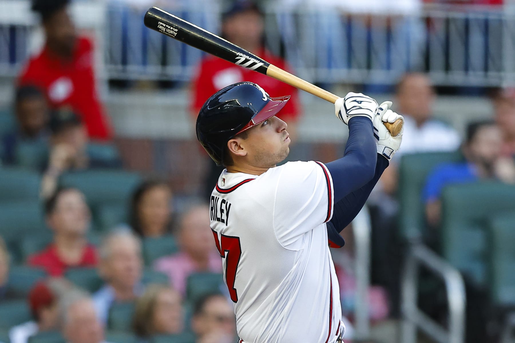 ATLANTA, GA - APRIL 28: Austin Riley #27 of the Atlanta Braves hits a solo home run during the first inning of an MLB game against the Chicago Cubs at Truist Park on April 28, 2022 in Atlanta, Georgia. (Photo by Todd Kirkland/Getty Images)