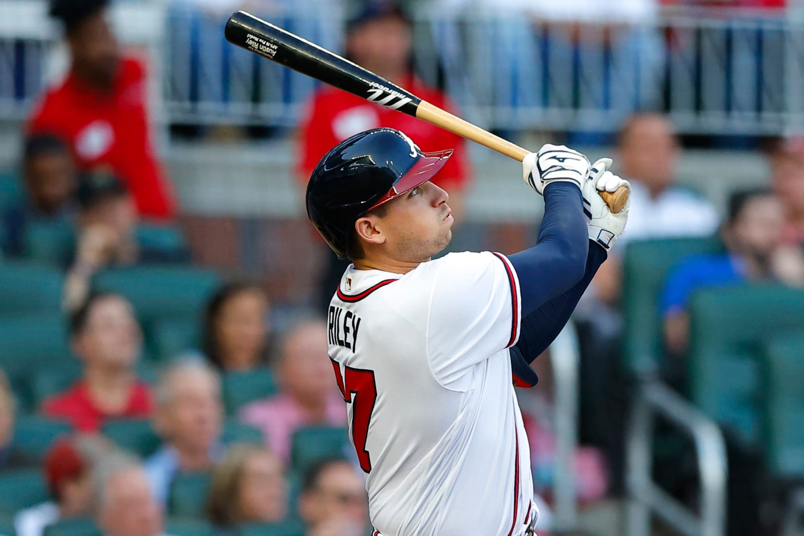 ATLANTA, GA - APRIL 28: Austin Riley #27 of the Atlanta Braves hits a solo home run during the first inning of an MLB game against the Chicago Cubs at Truist Park on April 28, 2022 in Atlanta, Georgia. (Photo by Todd Kirkland/Getty Images)