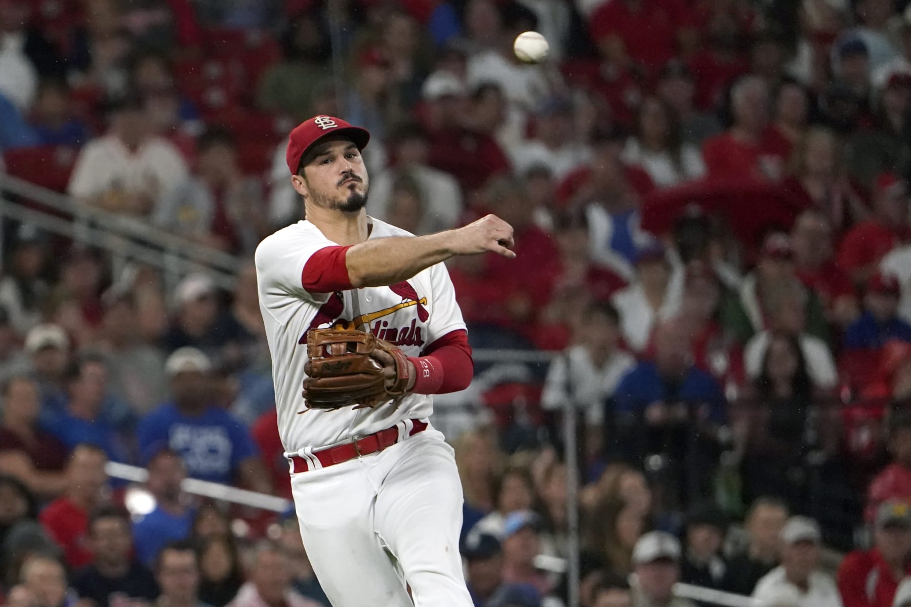 St. Louis Cardinals third baseman Nolan Arenado throws out Chicago Cubs' Nick Madrigal at first during the fifth inning of a baseball game Friday, Sept. 2, 2022, in St. Louis. (AP Photo/Jeff Roberson)