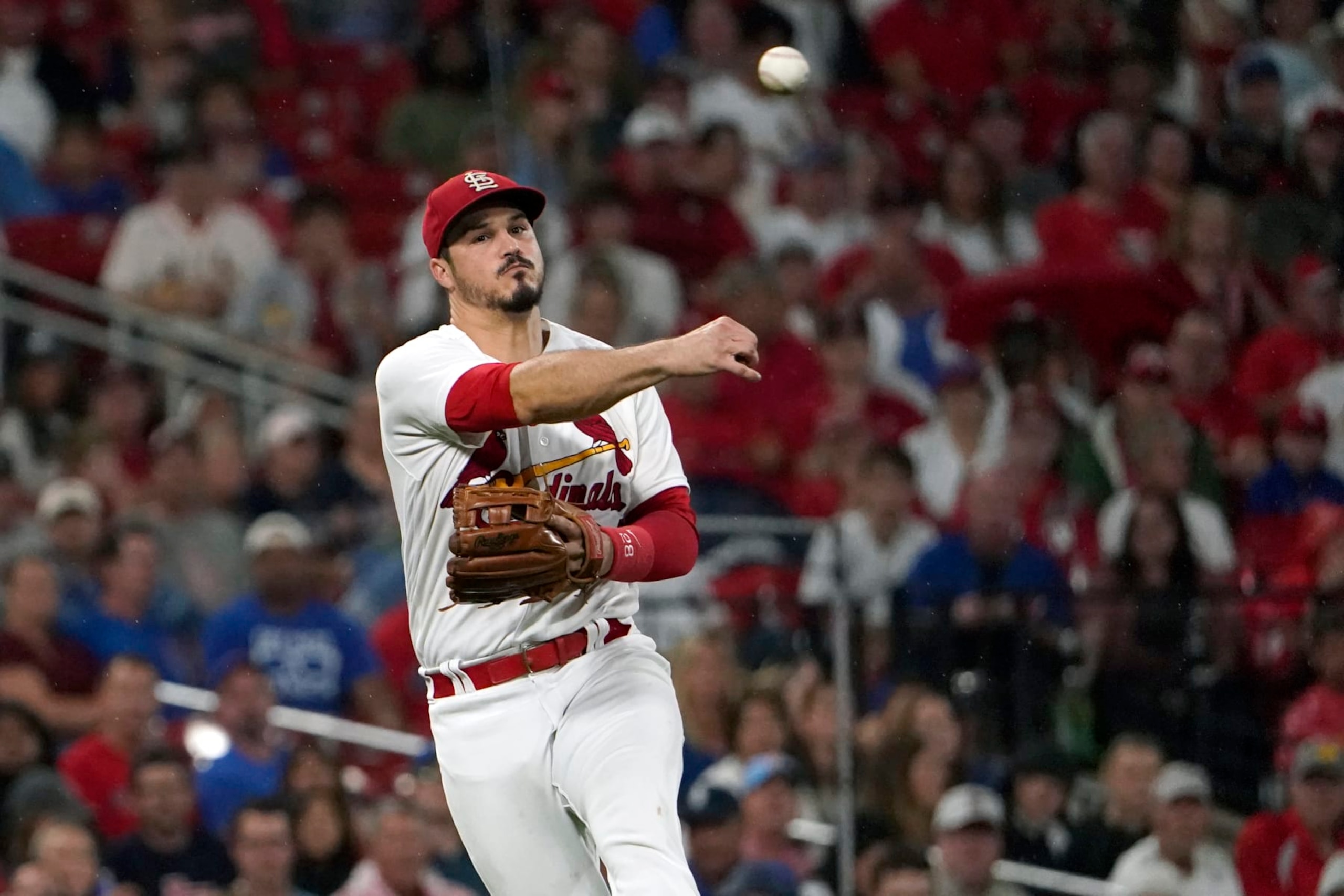 St. Louis Cardinals third baseman Nolan Arenado throws out Chicago Cubs' Nick Madrigal at first during the fifth inning of a baseball game Friday, Sept. 2, 2022, in St. Louis. (AP Photo/Jeff Roberson)