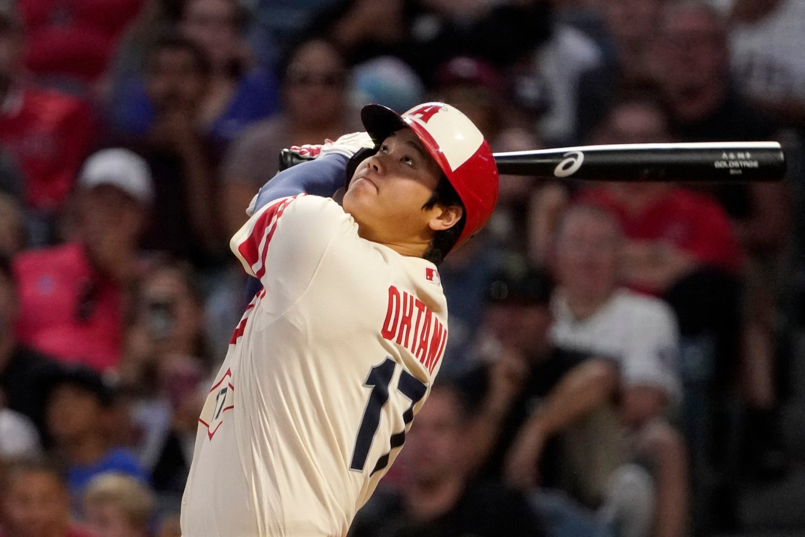 Los Angeles Angels' Shohei Ohtani swings as he hits a double during the first inning of a baseball game against the Seattle Mariners Friday, Sept. 16, 2022, in Anaheim, Calif. (AP Photo/Mark J. Terrill)