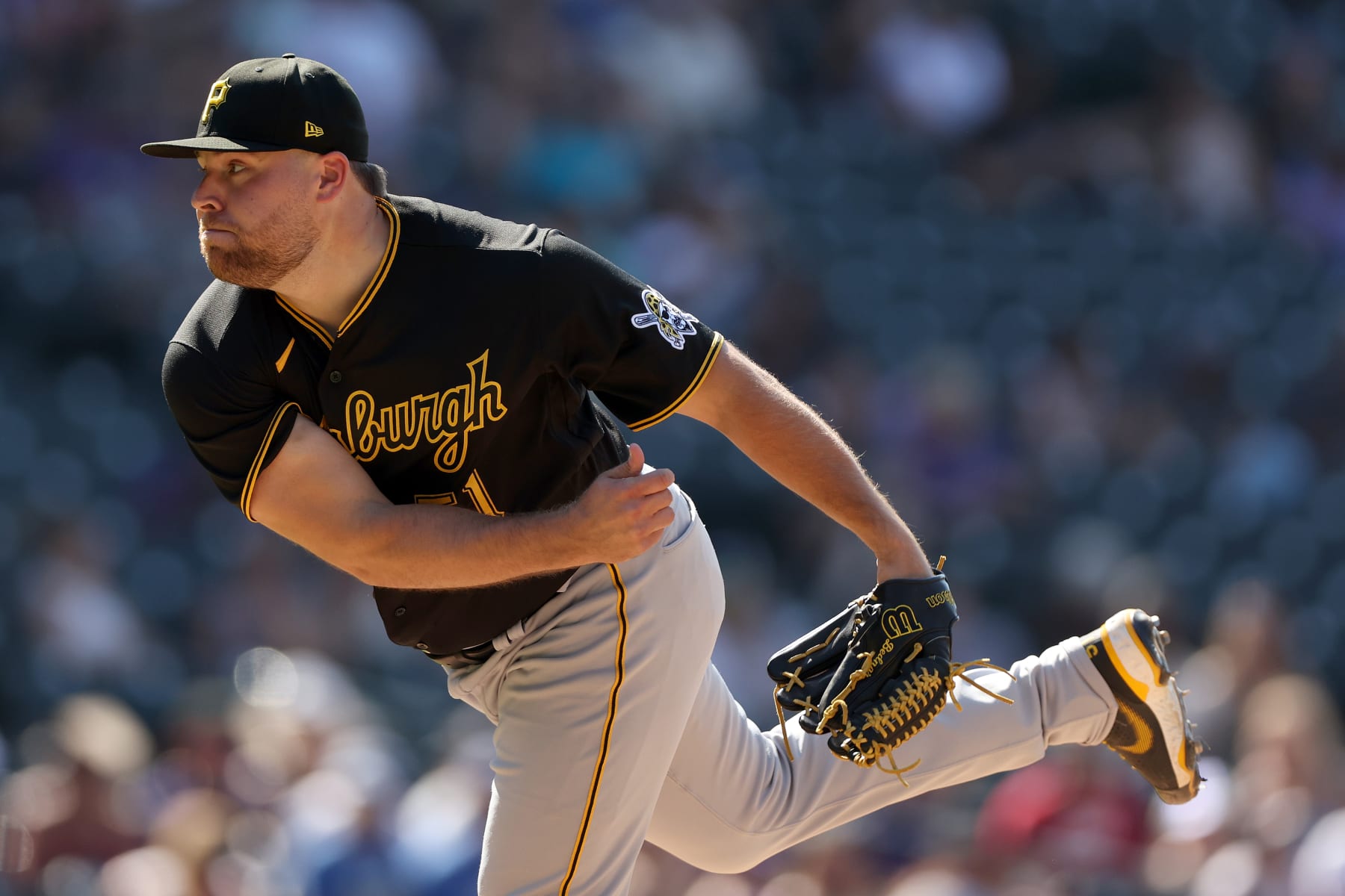 DENVER, COLORADO - JULY 17: Pitcher David Bednar #51 of the Pittsburgh Pirates throws against the Colorado Rockies in the ninth inning at Coors Field on July 17, 2022 in Denver, Colorado. (Photo by Matthew Stockman/Getty Images)