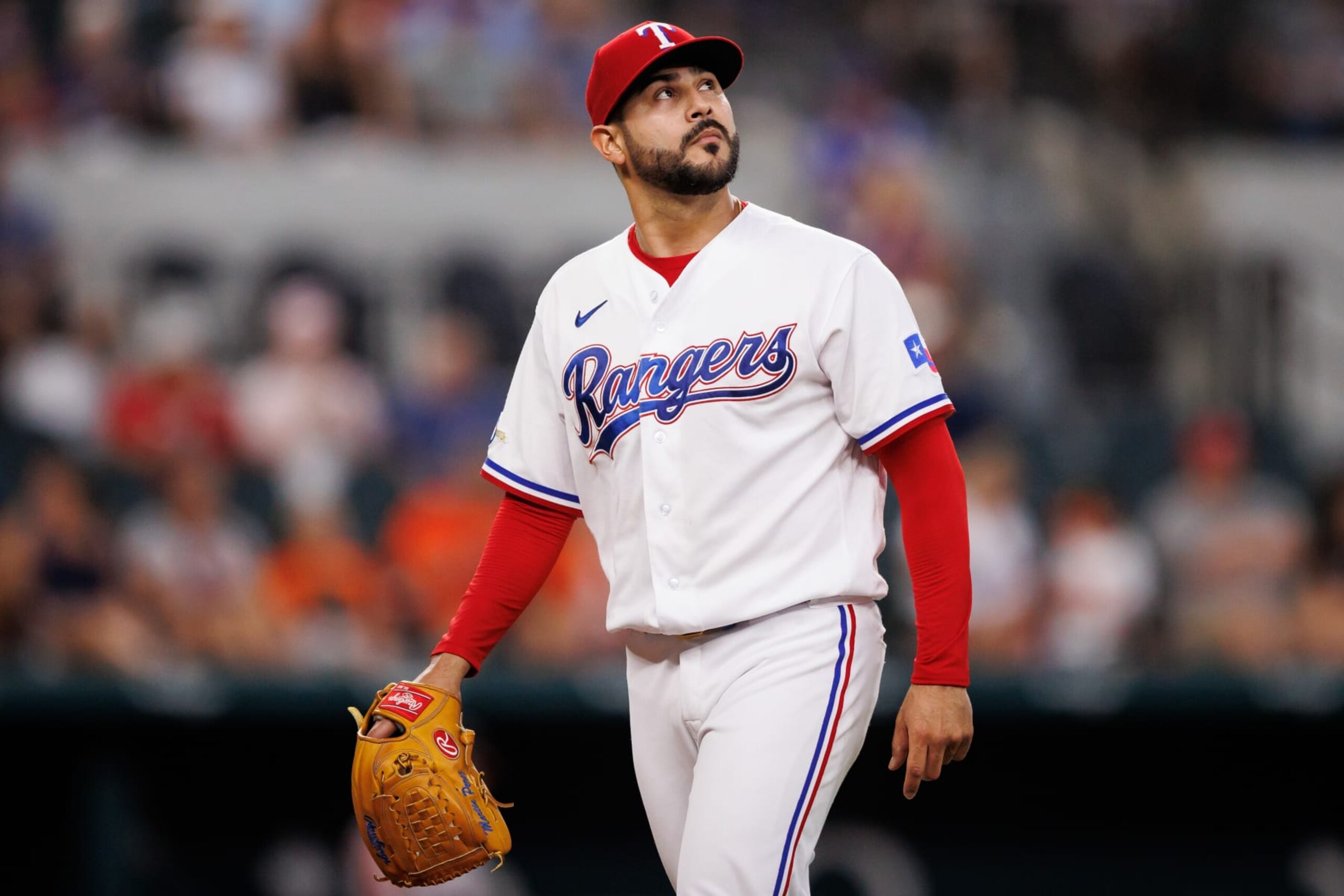 ARLINGTON, TX - AUGUST 03: Martin Perez #54 of the Texas Rangers looks on during a game against the Baltimore Orioles at Globe Life Field on August 3, 2022 in Arlington, Texas. (Photo by Bailey Orr/Texas Rangers/Getty Images)