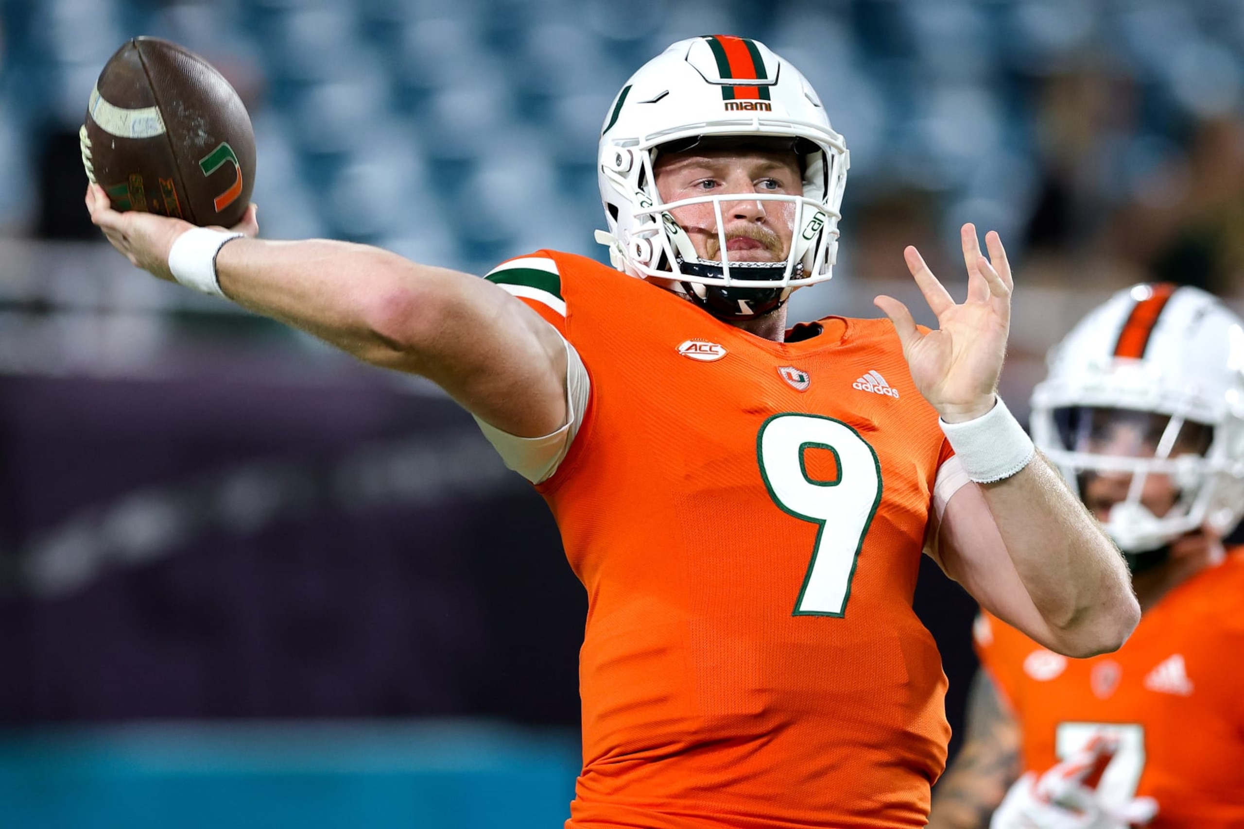 MIAMI GARDENS, FLORIDA - NOVEMBER 26: Tyler Van Dyke #9 of the Miami Hurricanes warms up prior to a game against the Pittsburgh Panthers at Hard Rock Stadium on November 26, 2022 in Miami Gardens, Florida. (Photo by Megan Briggs/Getty Images)