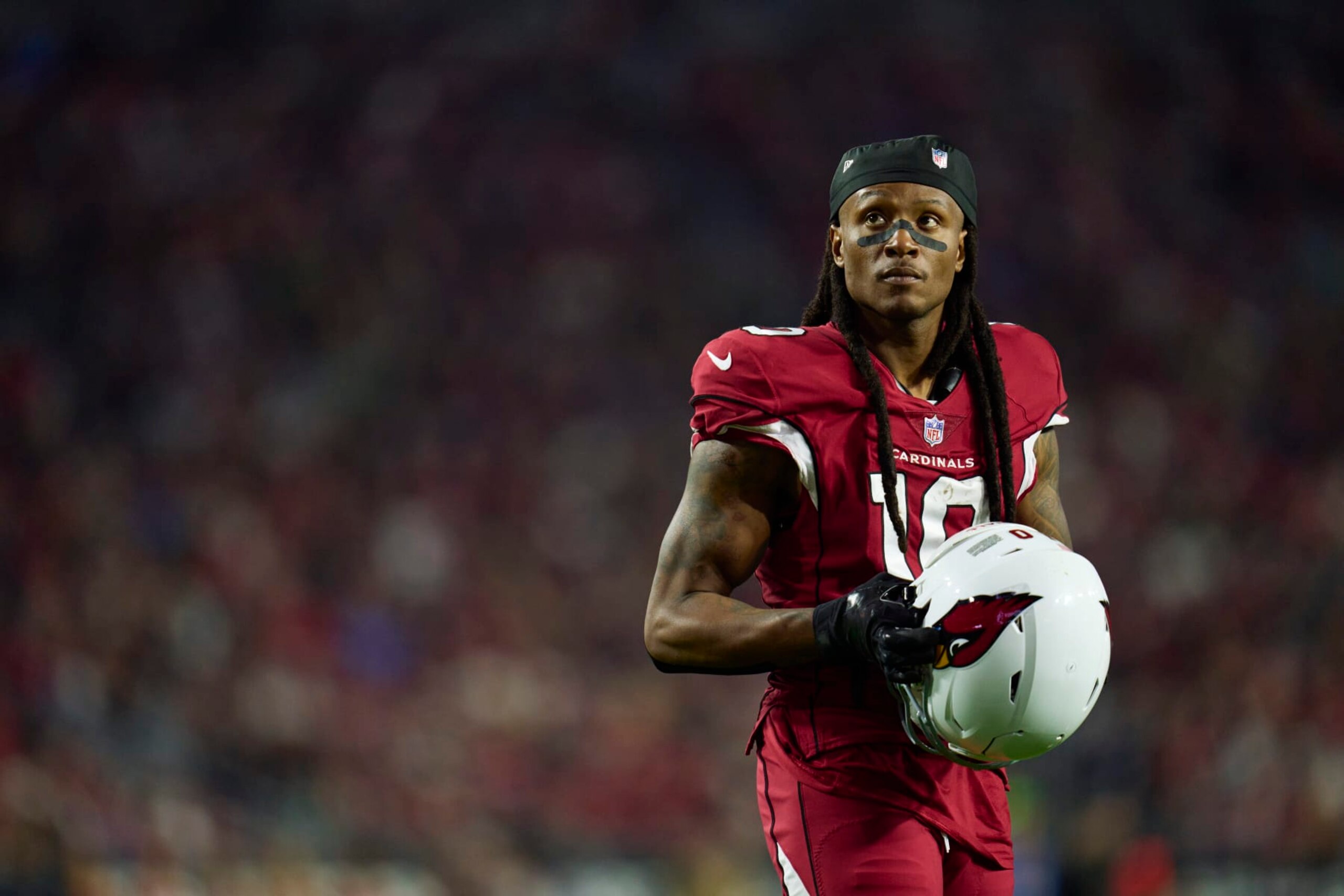 GLENDALE, AZ - DECEMBER 12: DeAndre Hopkins #10 of the Arizona Cardinals looks towards the sideline against the New England Patriots during the second half at State Farm Stadium on December 12, 2022 in Glendale, Arizona. (Photo by Cooper Neill/Getty Images)