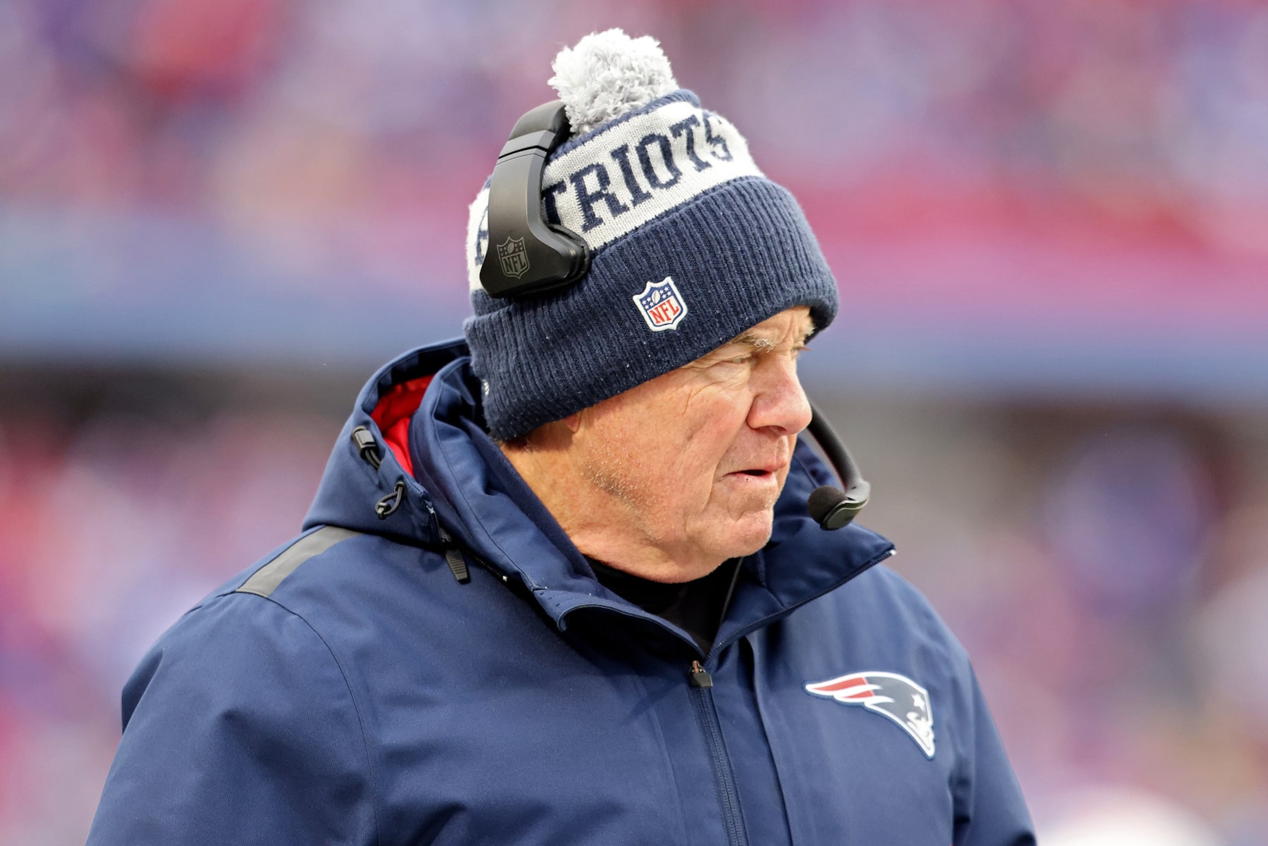 ORCHARD PARK, NEW YORK - JANUARY 08: Head coach Bill Belichick of the New England Patriots watches his team play during the third quarter against the Buffalo Bills at Highmark Stadium on January 08, 2023 in Orchard Park, New York. (Photo by Bryan M. Bennett/Getty Images) ORCHARD PARK, NEW YORK - JANUARY 08: Head coach Bill Belichick of the New England Patriots watches his team play during the third quarter against the Buffalo Bills at Highmark Stadium on January 08, 2023 in Orchard Park, New York. (Photo by Bryan M. Bennett/Getty Images)