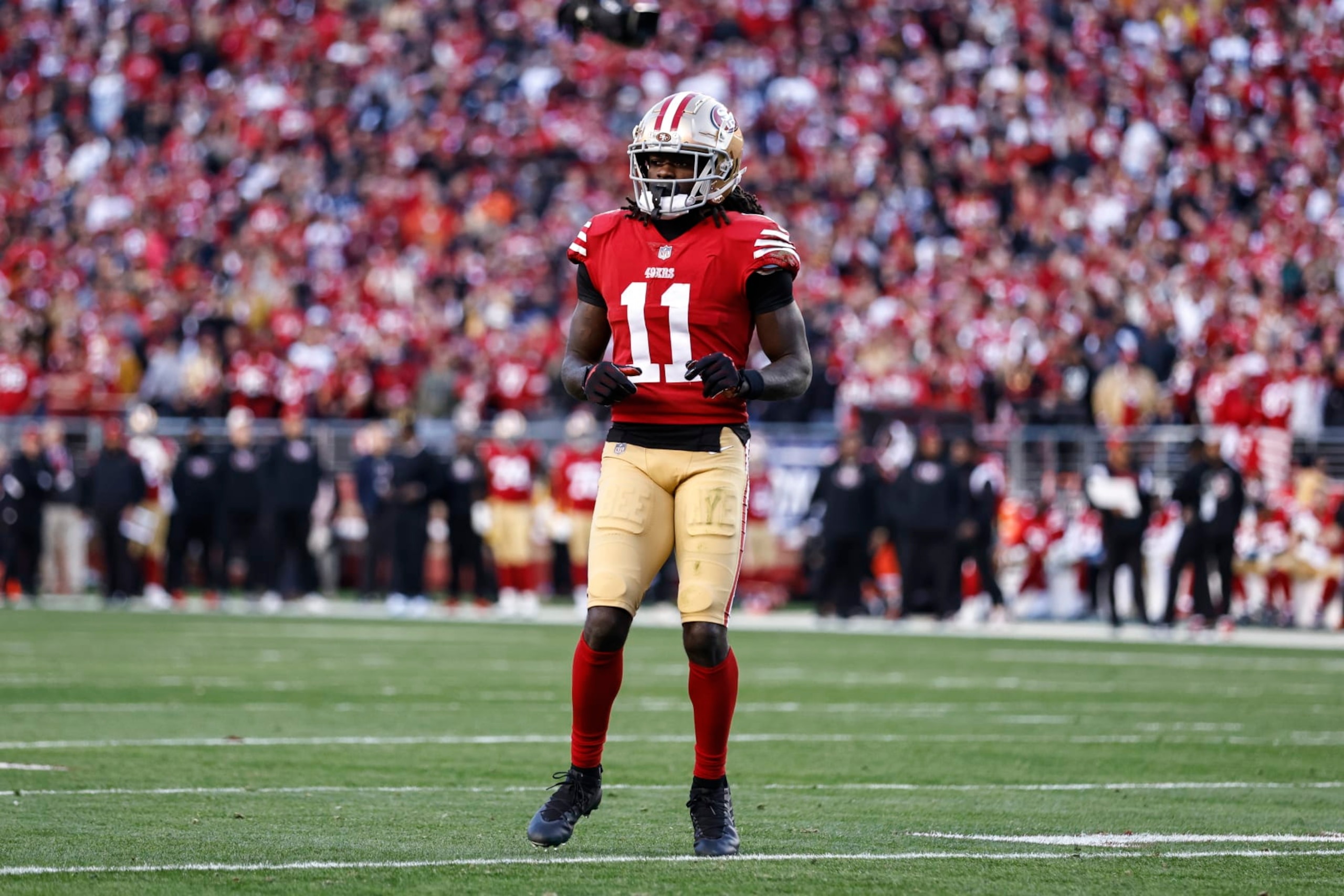 SANTA CLARA, CALIFORNIA - JANUARY 22: Brandon Aiyuk #11 of the San Francisco 49ers runs during an NFL divisional round playoff football game between the San Francisco 49ers and the Dallas Cowboys at Levi's Stadium on January 22, 2023 in Santa Clara, California. (Photo by Michael Owens/Getty Images)