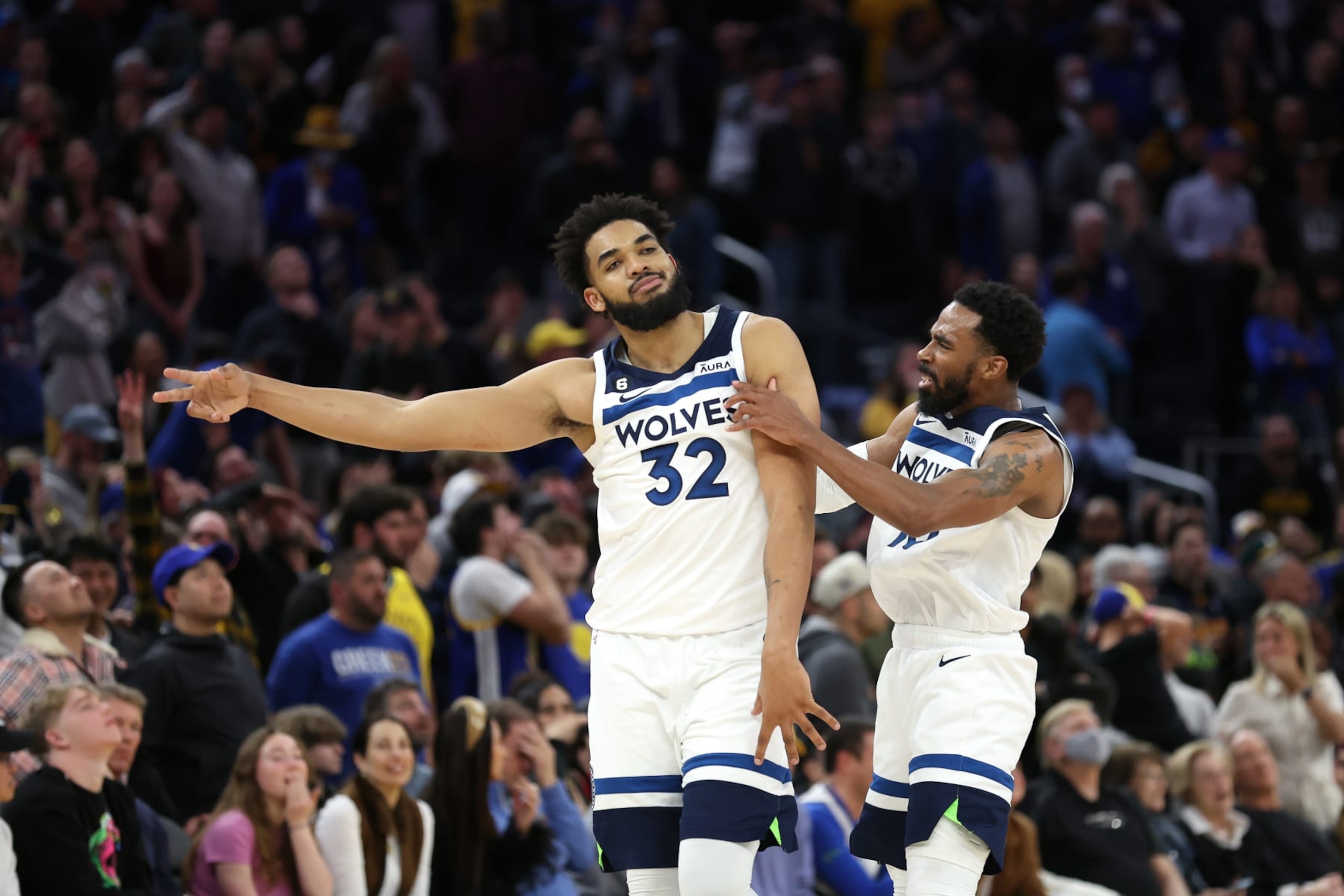 Karl-Anthony Towns and Mike Conley