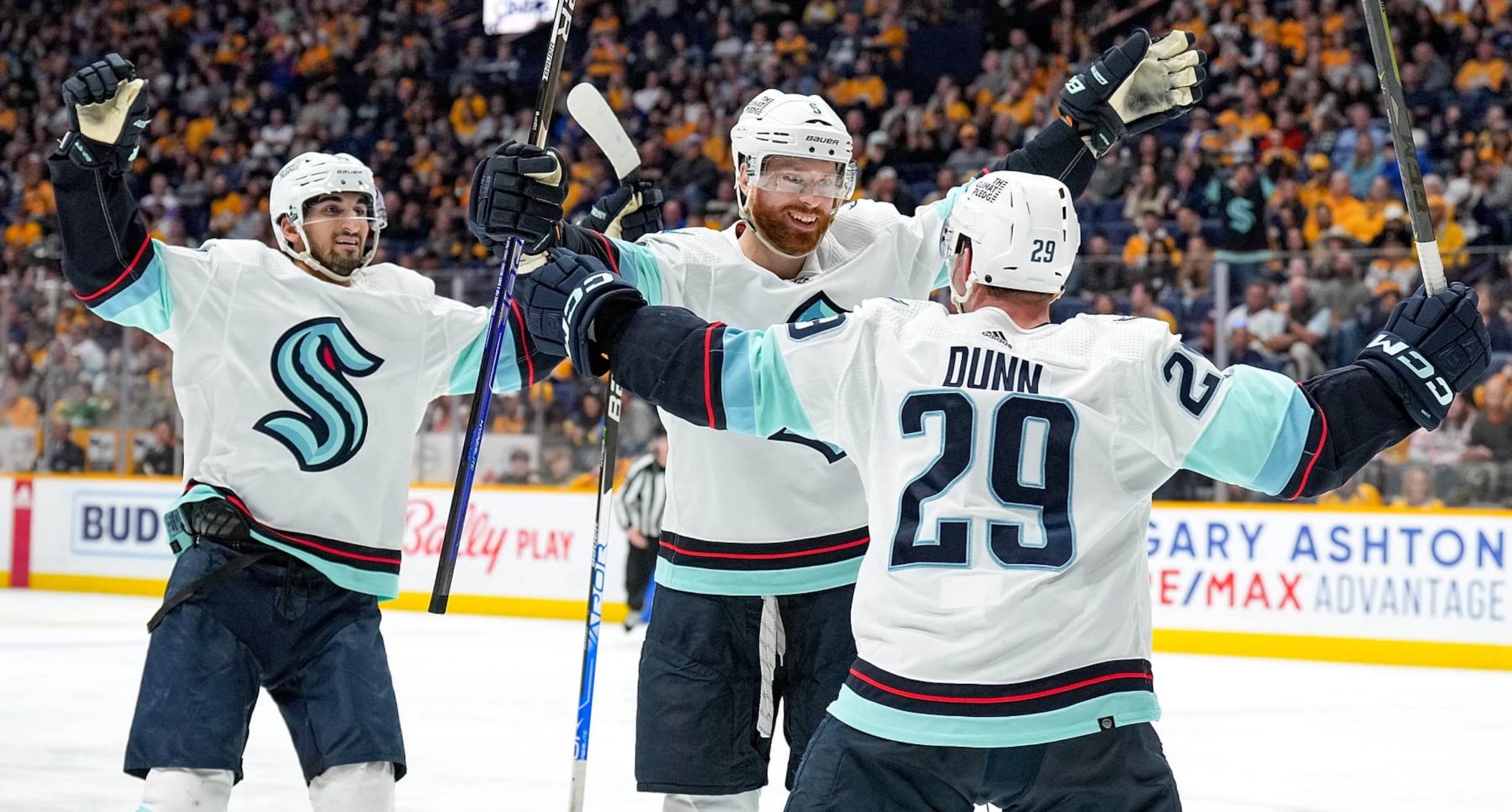 NASHVILLE, TENNESSEE - MARCH 25: Adam Larsson #6 celebrates his goal with Vince Dunn #29 of the Seattle Kraken against the Nashville Predators during an NHL game at Bridgestone Arena on March 25, 2023 in Nashville, Tennessee. (Photo by John Russell/NHLI via Getty Images)