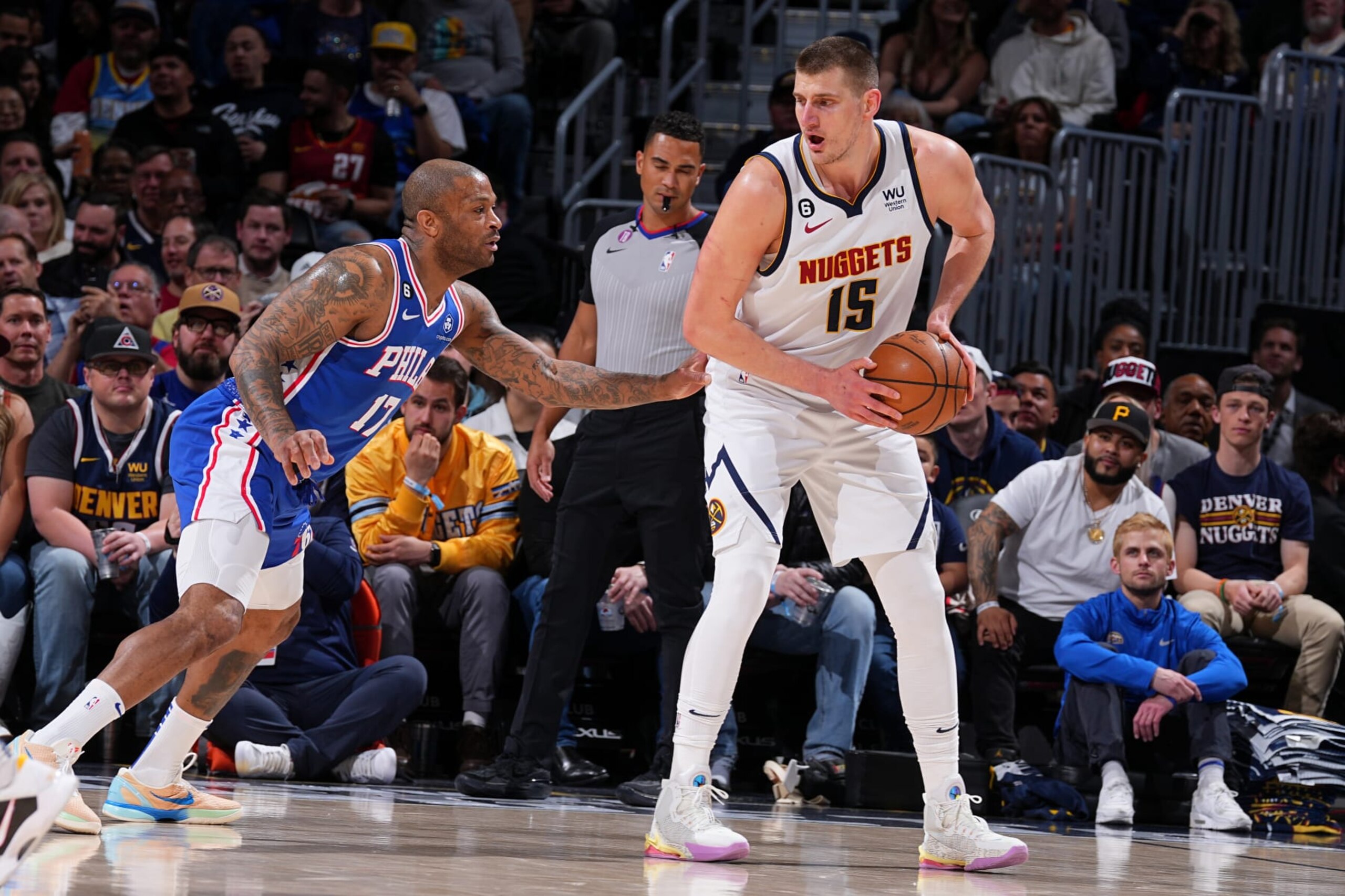 DENVER, CO - MARCH 27: Nikola Jokic #15 of the Denver Nuggets handles the ball during the game against the Philadelphia 76ers on March 27, 2023 at the Ball Arena in Denver, Colorado. NOTE TO USER: User expressly acknowledges and agrees that, by downloading and/or using this Photograph, user is consenting to the terms and conditions of the Getty Images License Agreement. Mandatory Copyright Notice: Copyright 2023 NBAE (Photo by Bart Young/NBAE via Getty Images)