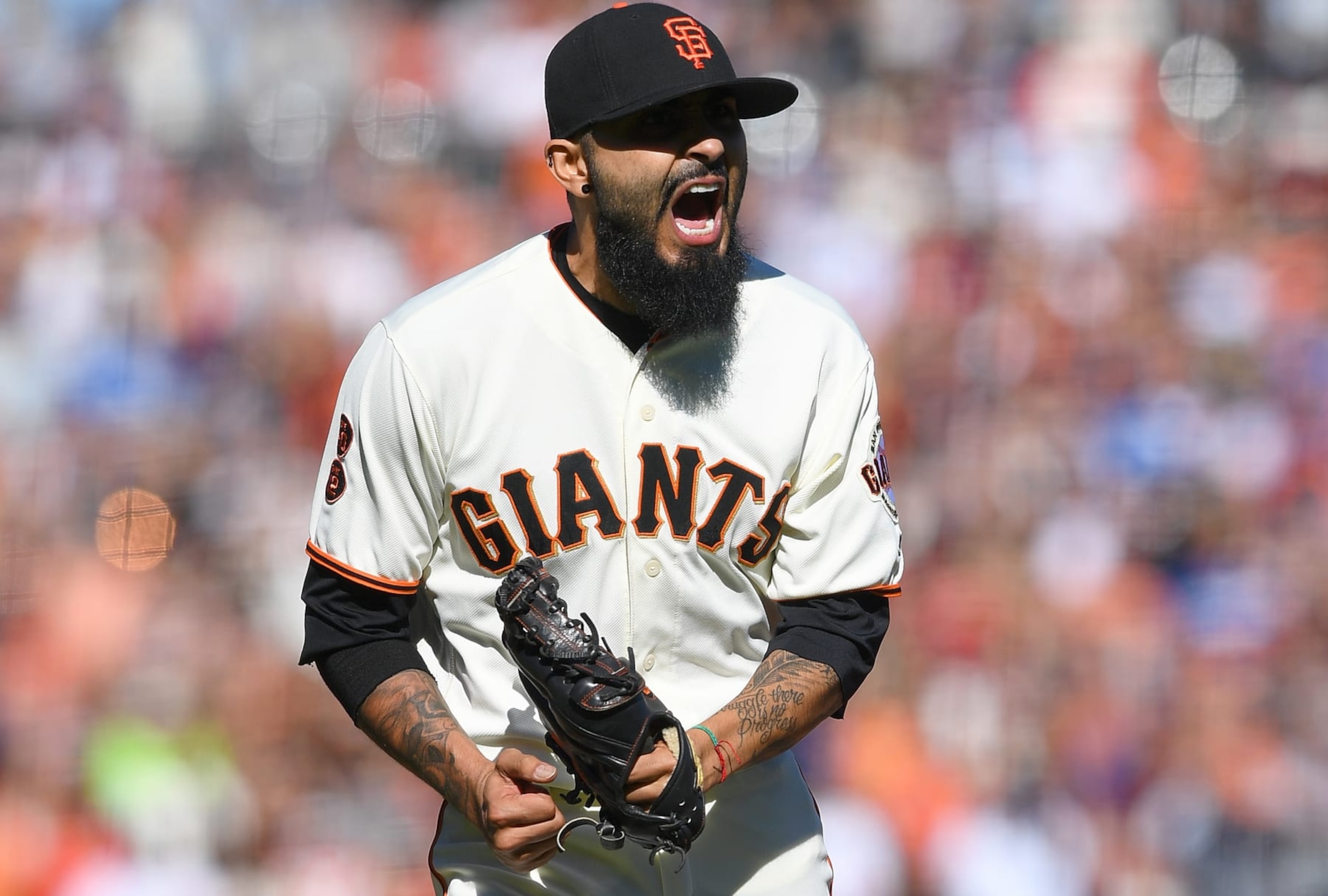 SAN FRANCISCO, CA - OCTOBER 01:  Sergio Romo #54 of the San Francisco Giants reacts after striking out Corey Seager #5 of the Los Angeles Dodgers for the final out of the game at AT&T Park on October 1, 2016 in San Francisco, California. Rome saved the game and the Giants won 3-0.  (Photo by Thearon W. Henderson/Getty Images)