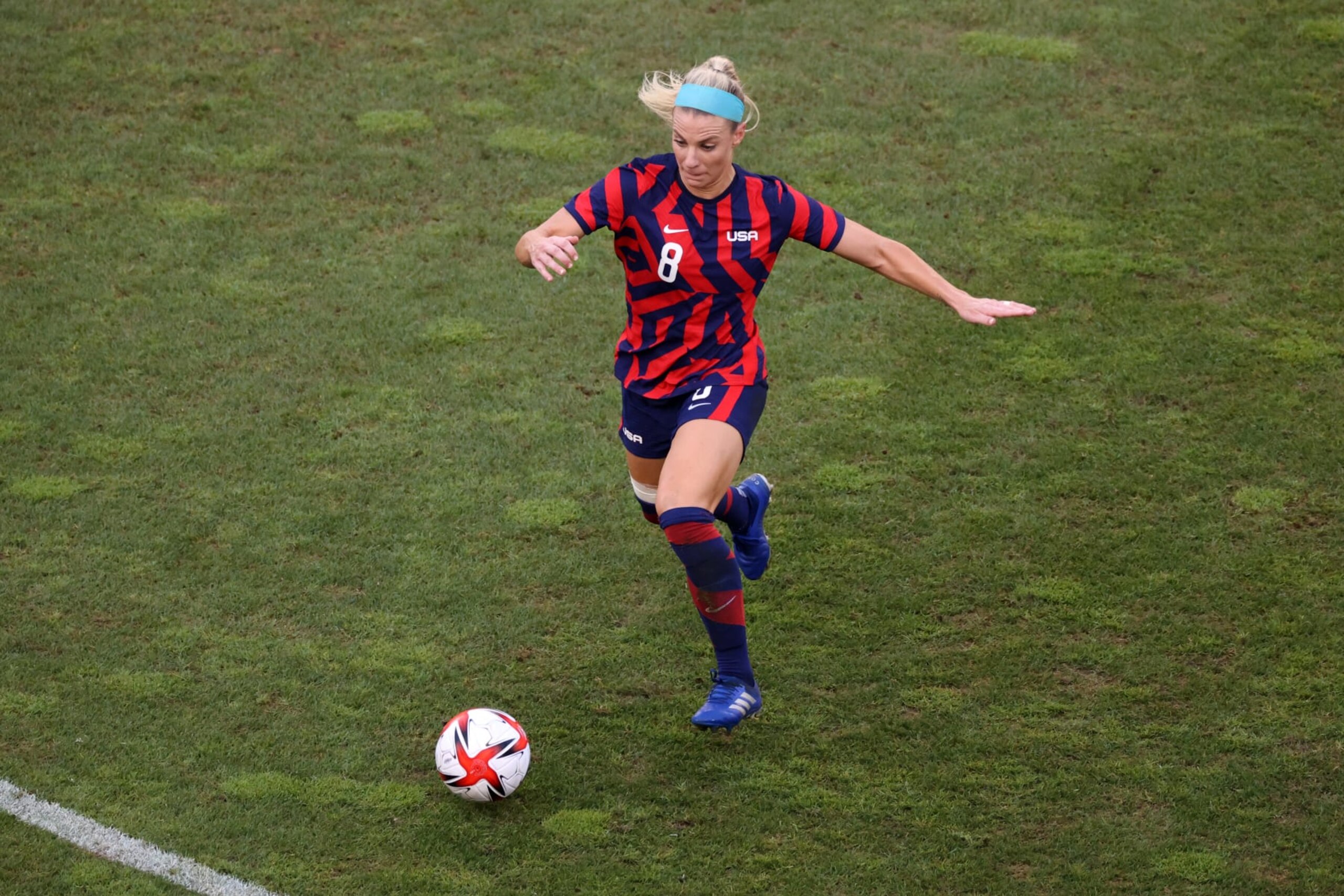 KASHIMA, JAPAN - AUGUST 05: Julie Ertz #8 of Team United States runs with the ball during the Women's Bronze Medal match between United States and Australia on day thirteen of the Tokyo 2020 Olympic Games at Kashima Stadium on August 05, 2021 in Kashima, Japan. (Photo by Atsushi Tomura/Getty Images)
