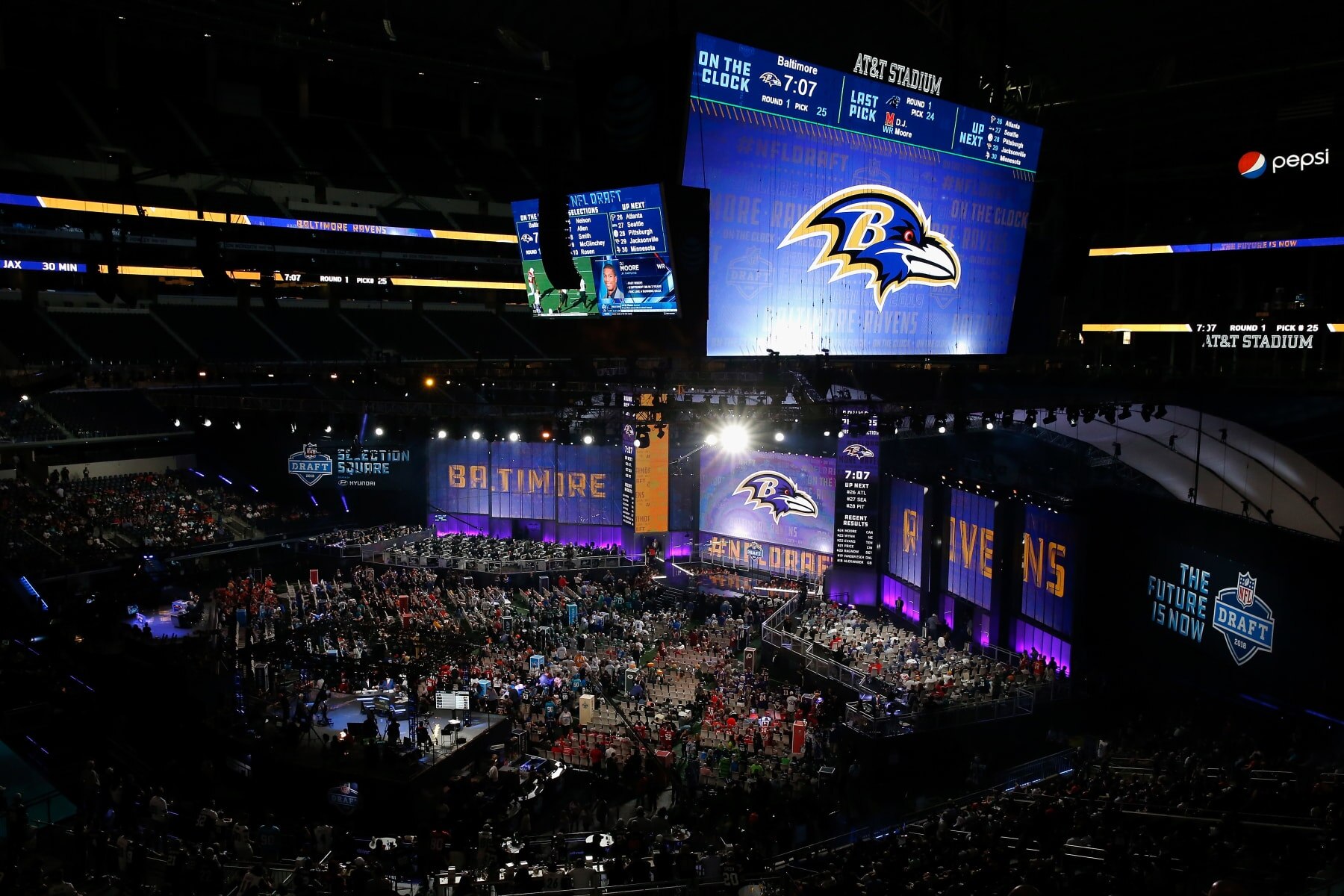 ARLINGTON, TX - APRIL 26:  The Baltimore Ravens logo is seen on a video board during the first round of the 2018 NFL Draft at AT&T Stadium on April 26, 2018 in Arlington, Texas.  (Photo by Tim Warner/Getty Images)