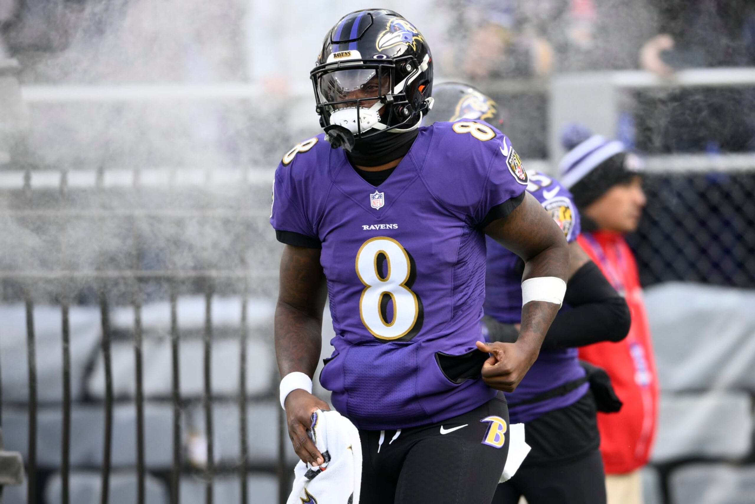 Baltimore Ravens quarterback Lamar Jackson (8) takes to the field before an NFL football game against the Denver Broncos, Sunday, Dec. 4, 2022, in Baltimore. (AP Photo/Nick Wass)
