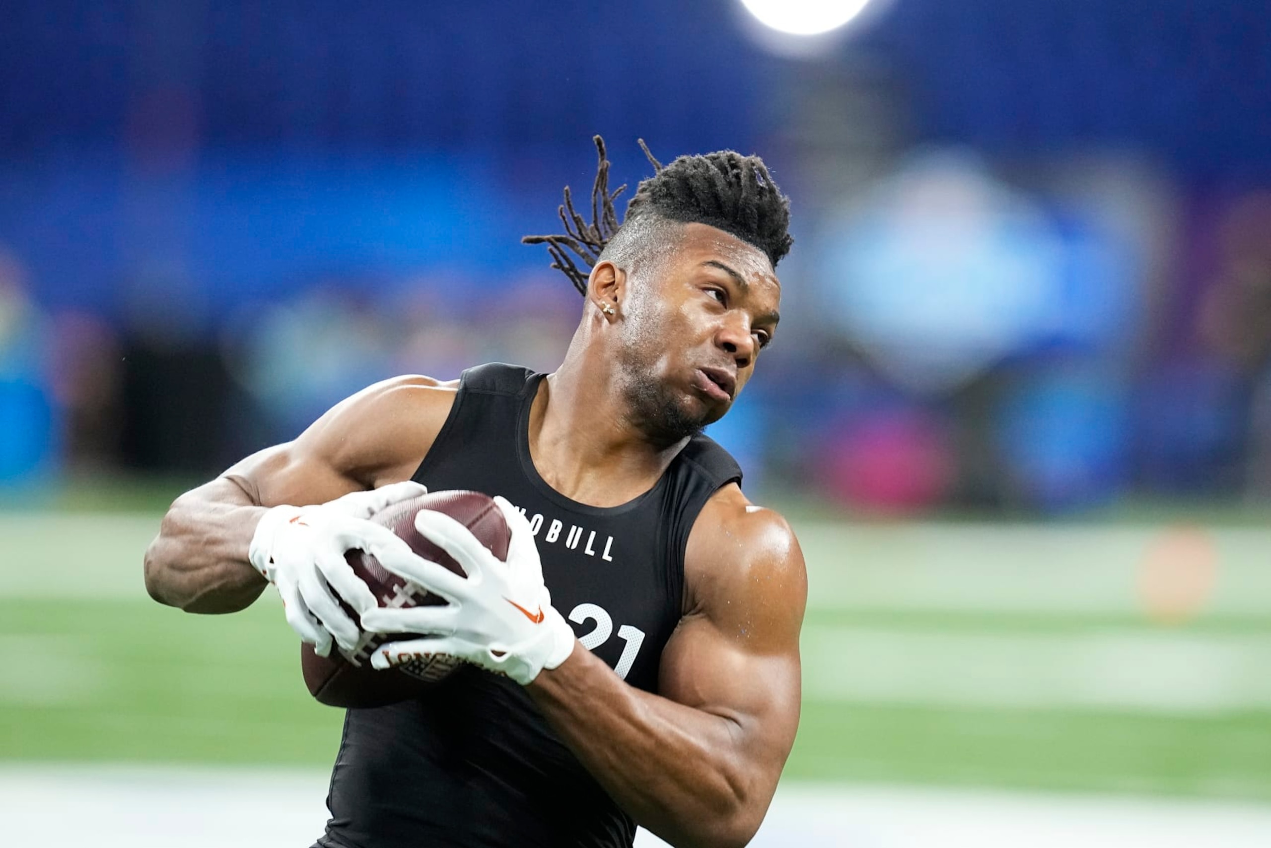 Texas running back Bijan Robinson runs a drill at the NFL football scouting combine in Indianapolis, Sunday, March 5, 2023. (AP Photo/Darron Cummings) Texas running back Bijan Robinson runs a drill at the NFL football scouting combine in Indianapolis, Sunday, March 5, 2023. (AP Photo/Darron Cummings)