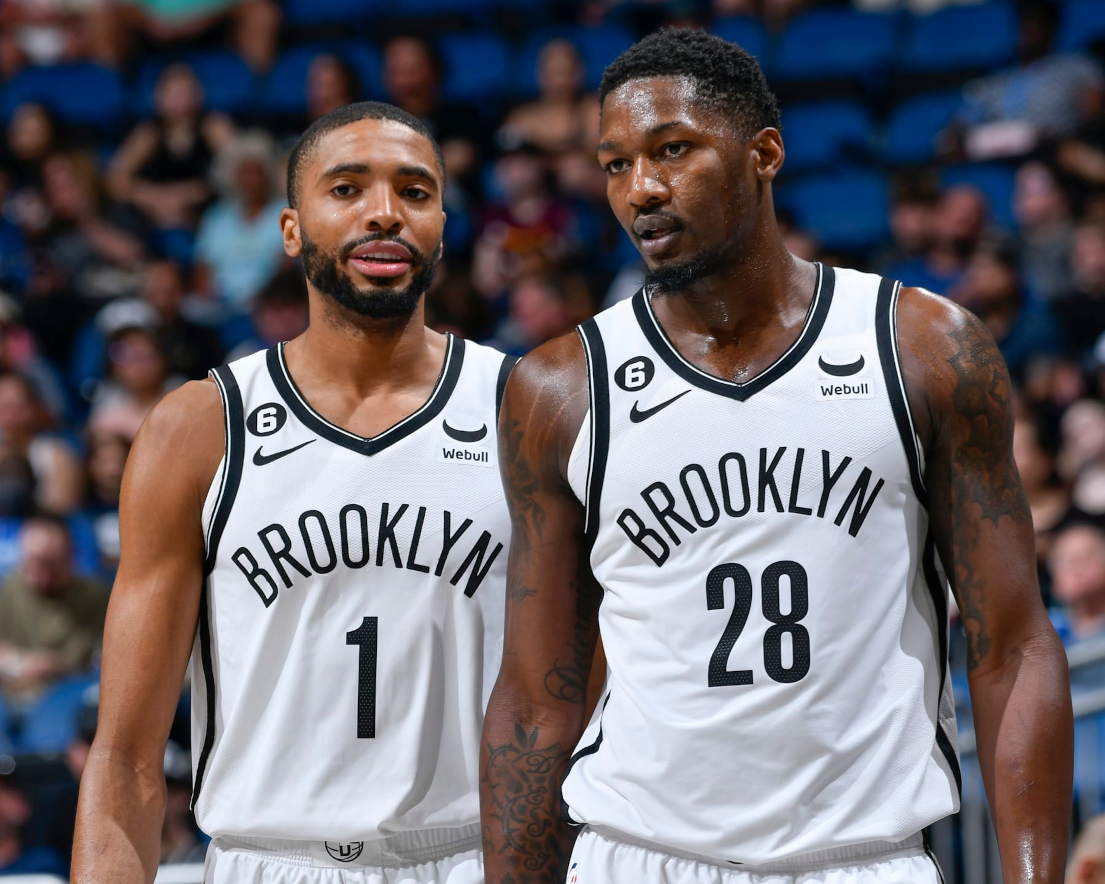 ORLANDO, FL - MARCH 26: Dorian Finney-Smith #28 and Mikal Bridges #1 of the Brooklyn Nets looks on during the game on March 26, 2023 at Amway Center in Orlando, Florida. NOTE TO USER: User expressly acknowledges and agrees that, by downloading and or using this photograph, User is consenting to the terms and conditions of the Getty Images License Agreement. Mandatory Copyright Notice: Copyright 2023 NBAE (Photo by Fernando Medina/NBAE via Getty Images)