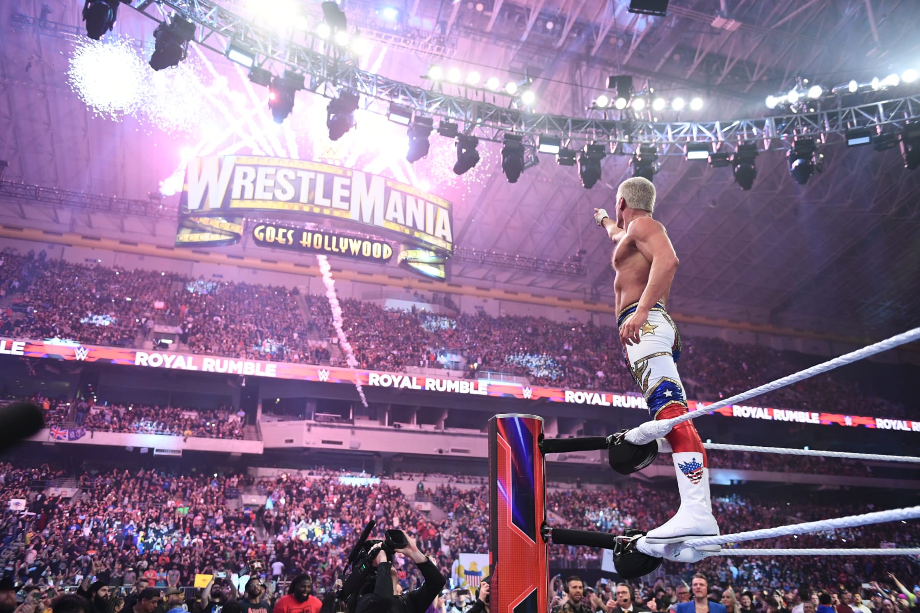 Rhodes points to the WrestleMania sign after winning the men's Royal Rumble match.