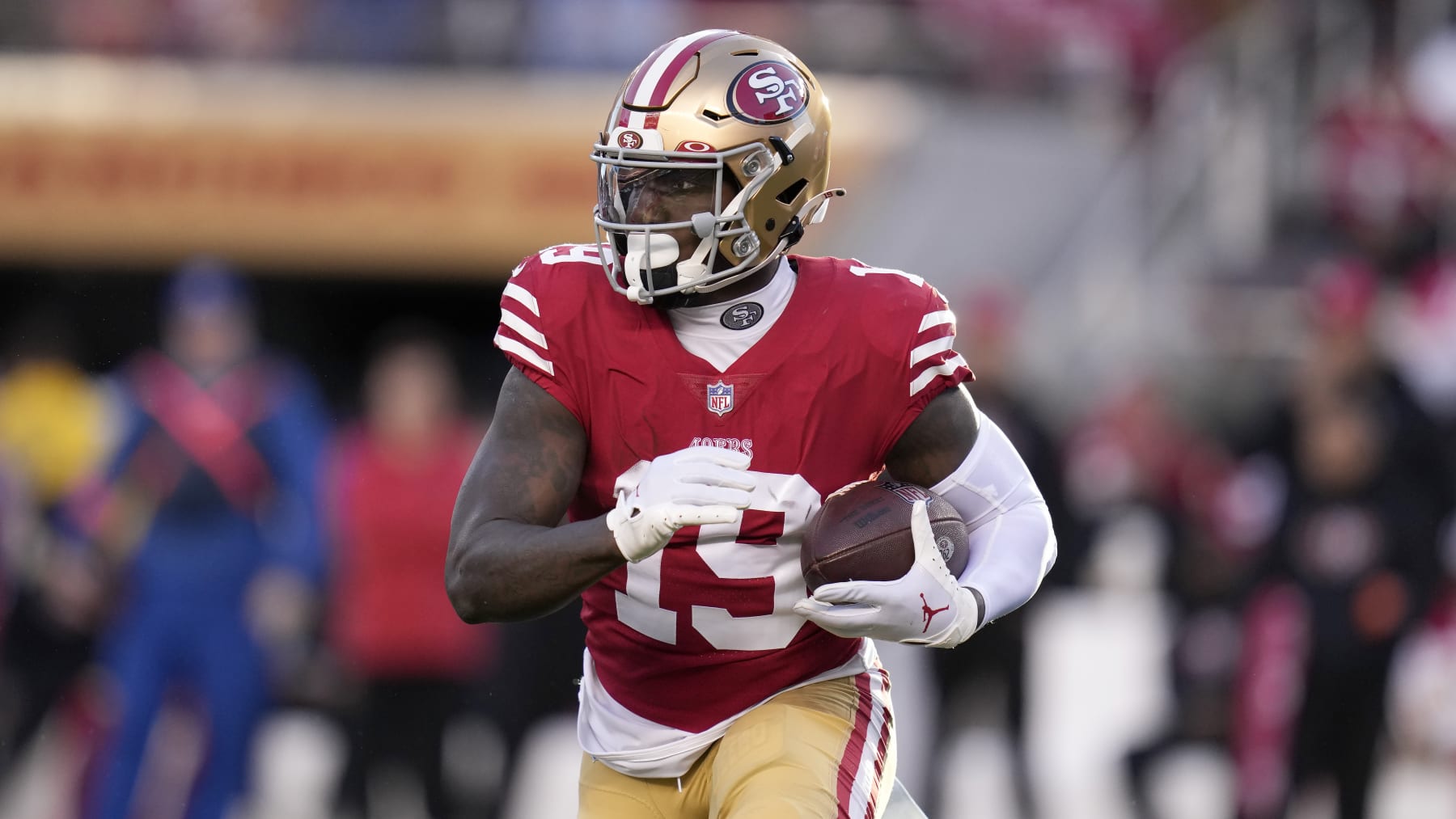 San Francisco 49ers wide receiver Deebo Samuel (19) runs against the Dallas Cowboys during an NFL divisional round playoff football game in Santa Clara, Calif., Sunday, Jan. 22, 2023. (AP Photo/Godofredo A. Vásquez)