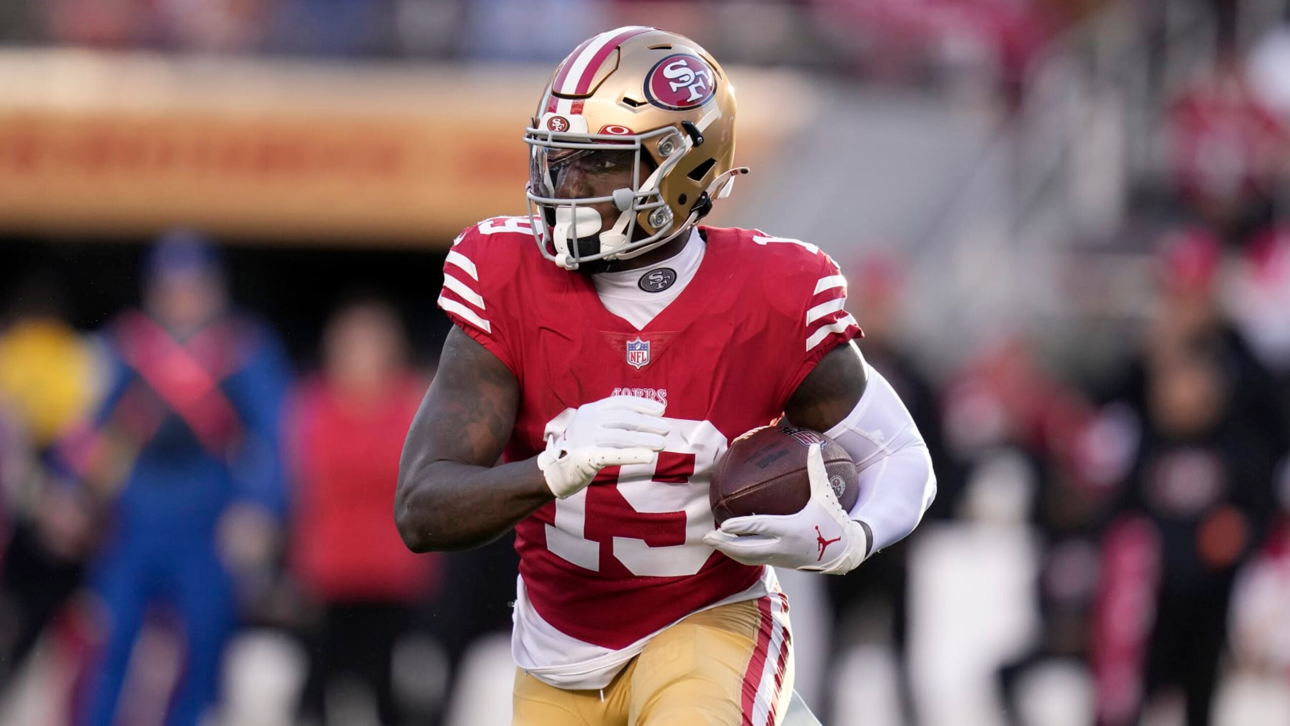 San Francisco 49ers wide receiver Deebo Samuel (19) runs against the Dallas Cowboys during an NFL divisional round playoff football game in Santa Clara, Calif., Sunday, Jan. 22, 2023. (AP Photo/Godofredo A. Vásquez)