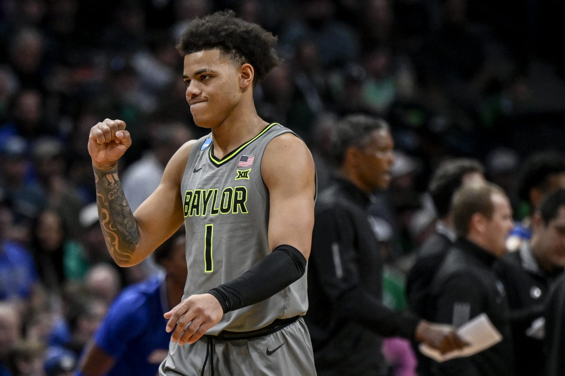 DENVER, CO - MARCH 17: Keyonte George (1) of the Baylor Bears pumps his fist as the Bears take control of the UC Santa Barbara Gauchos during the second half of Baylors 74-56 win in the first round NCAA mens basketball tournament at Ball Arena in Denver on Friday, March 17, 2023. (Photo by AAron Ontiveroz/MediaNews Group/The Denver Post via Getty Images)
