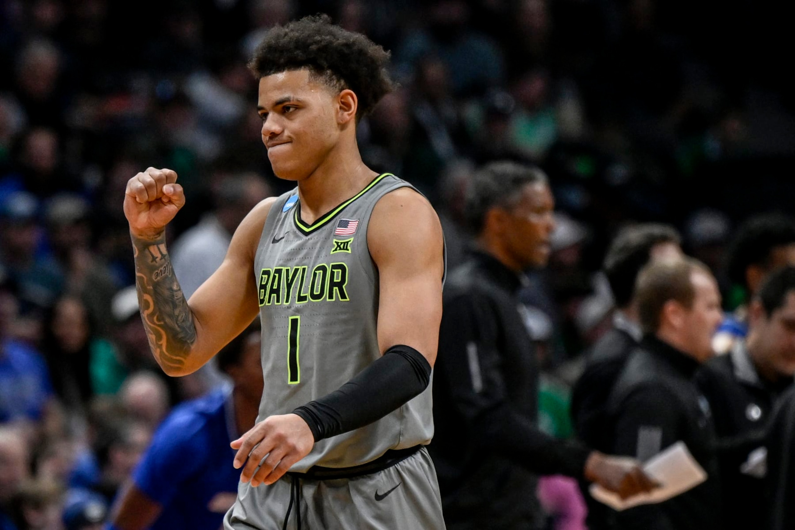 DENVER, CO - MARCH 17: Keyonte George (1) of the Baylor Bears pumps his fist as the Bears take control of the UC Santa Barbara Gauchos during the second half of Baylors 74-56 win in the first round NCAA mens basketball tournament at Ball Arena in Denver on Friday, March 17, 2023. (Photo by AAron Ontiveroz/MediaNews Group/The Denver Post via Getty Images)