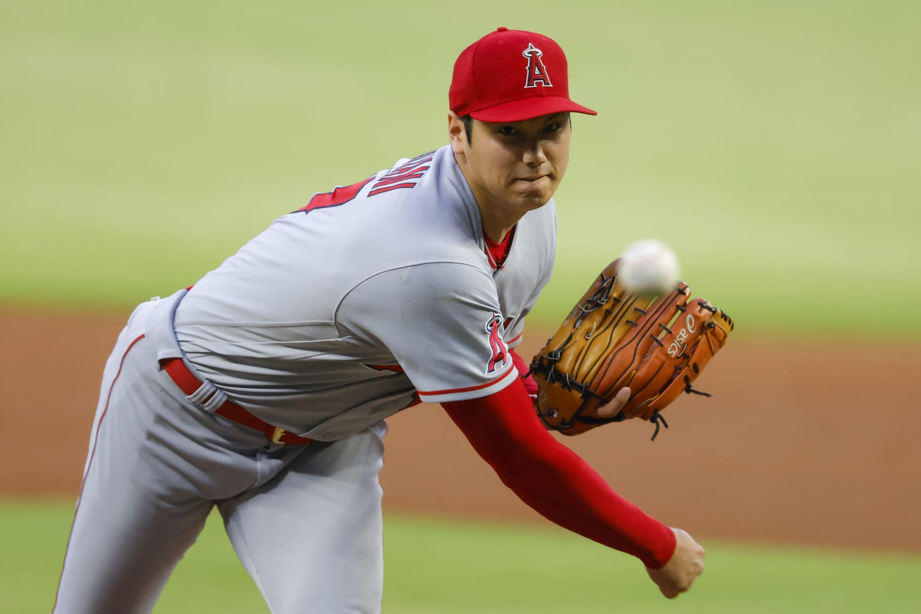 ATLANTA, GA - JULY 22: Shohei Ohtani #17 of the Los Angeles Angels pitches during the first inning against the Atlanta Braves at Truist Park on July 22, 2022 in Atlanta, Georgia. (Photo by Todd Kirkland/Getty Images)