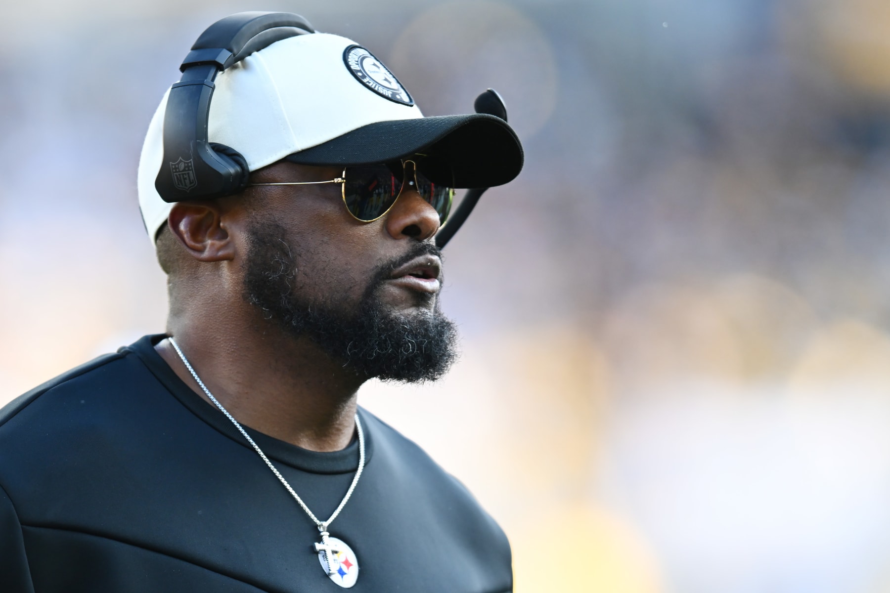 PITTSBURGH, PENNSYLVANIA - JANUARY 08: Head coach Mike Tomlin of the Pittsburgh Steelers looks on during the first half of the game against the Cleveland Browns at Acrisure Stadium on January 08, 2023 in Pittsburgh, Pennsylvania. (Photo by Joe Sargent/Getty Images)