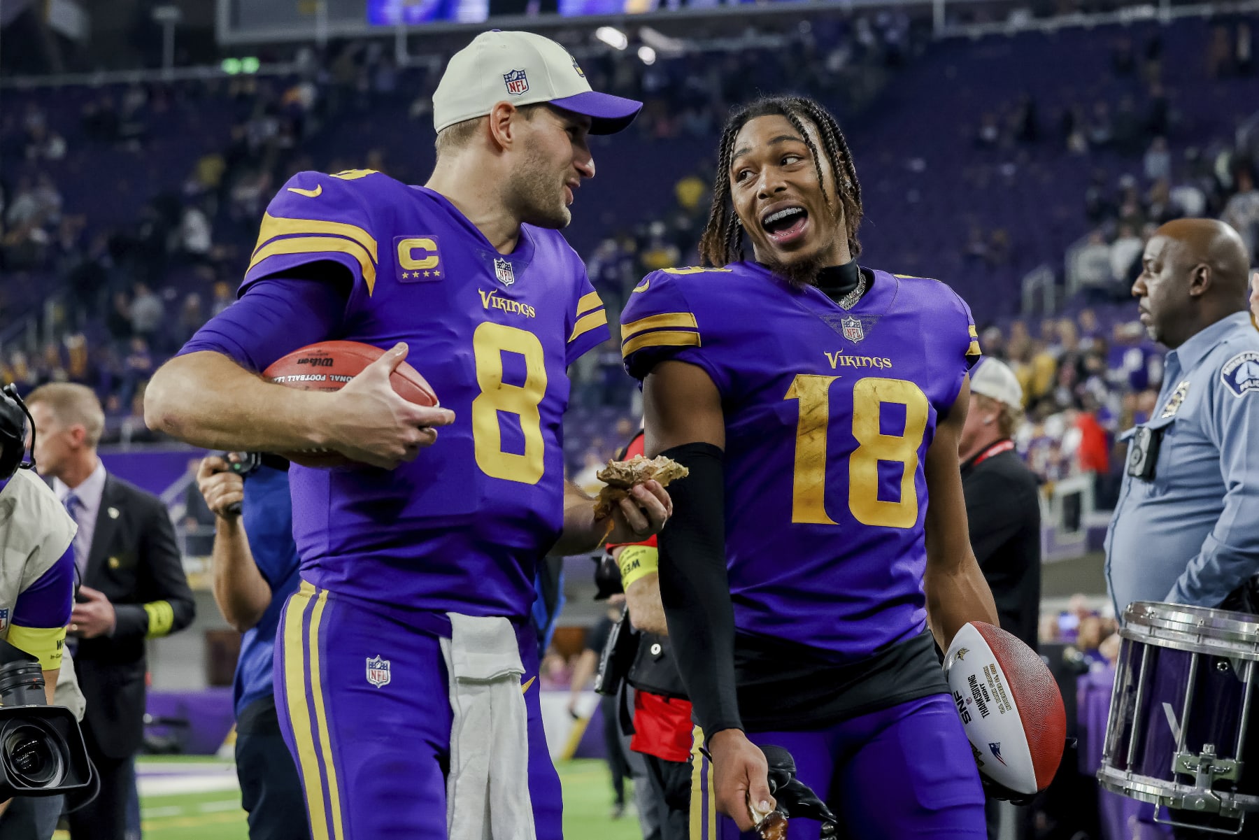 Kirk Cousins (left) and Justin Jefferson (right)